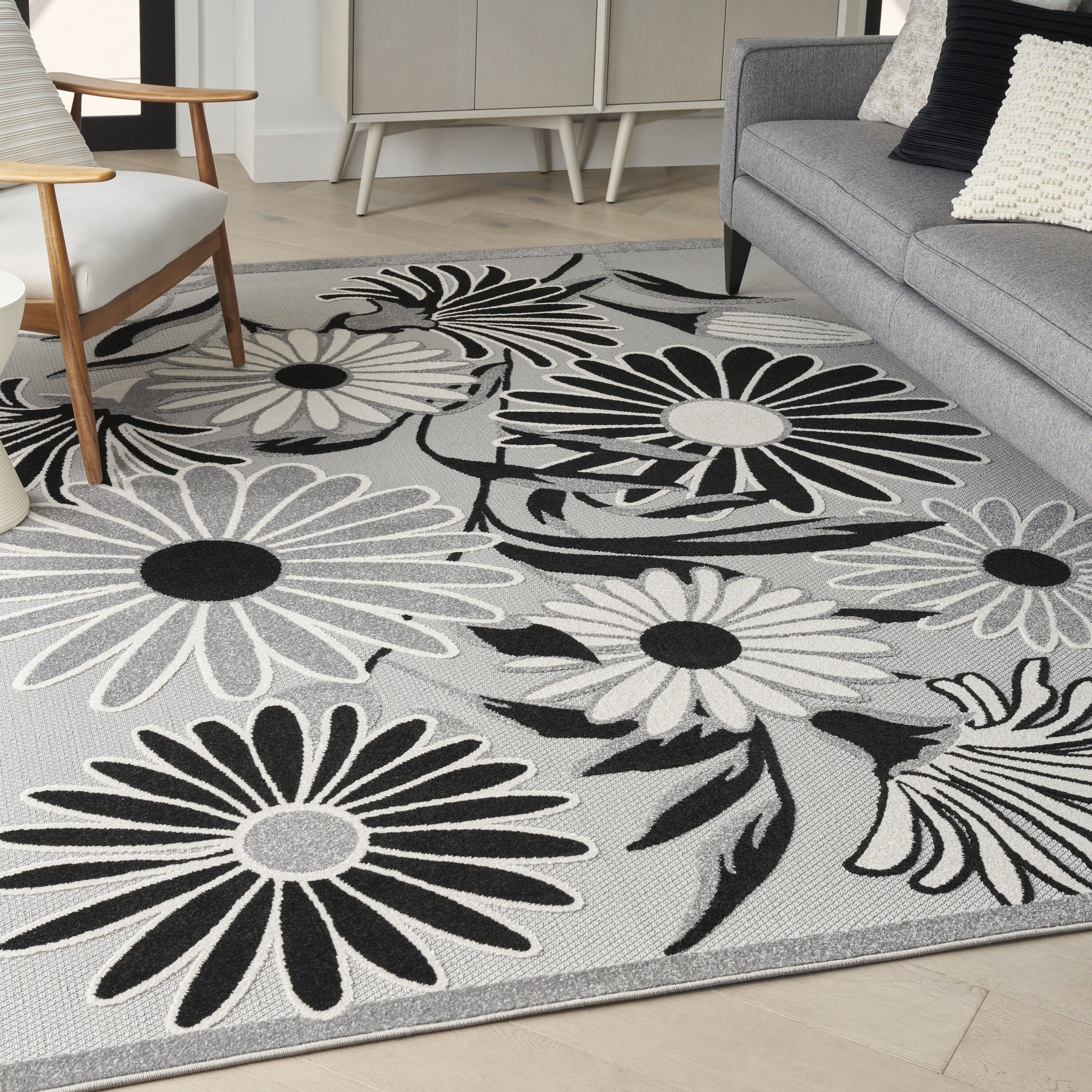 Nourison 099446171450 Aloha 7 x 10 (ft) Loomed Polypropylene Black White Rectangular Indoor/Outdoor Floral/Botanical Tropical Area rug