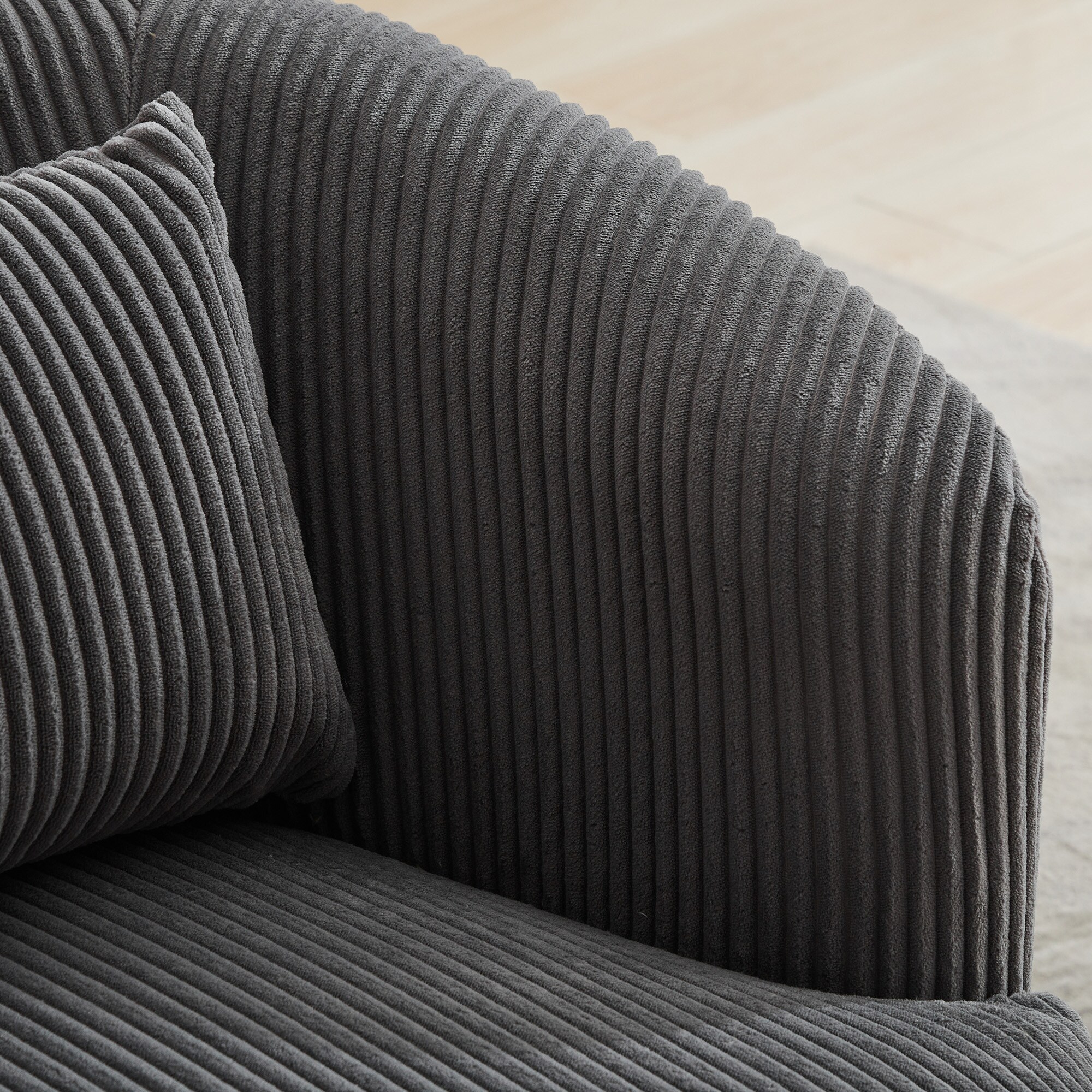 Close-up of corduroy ribbed fabric on chair arm