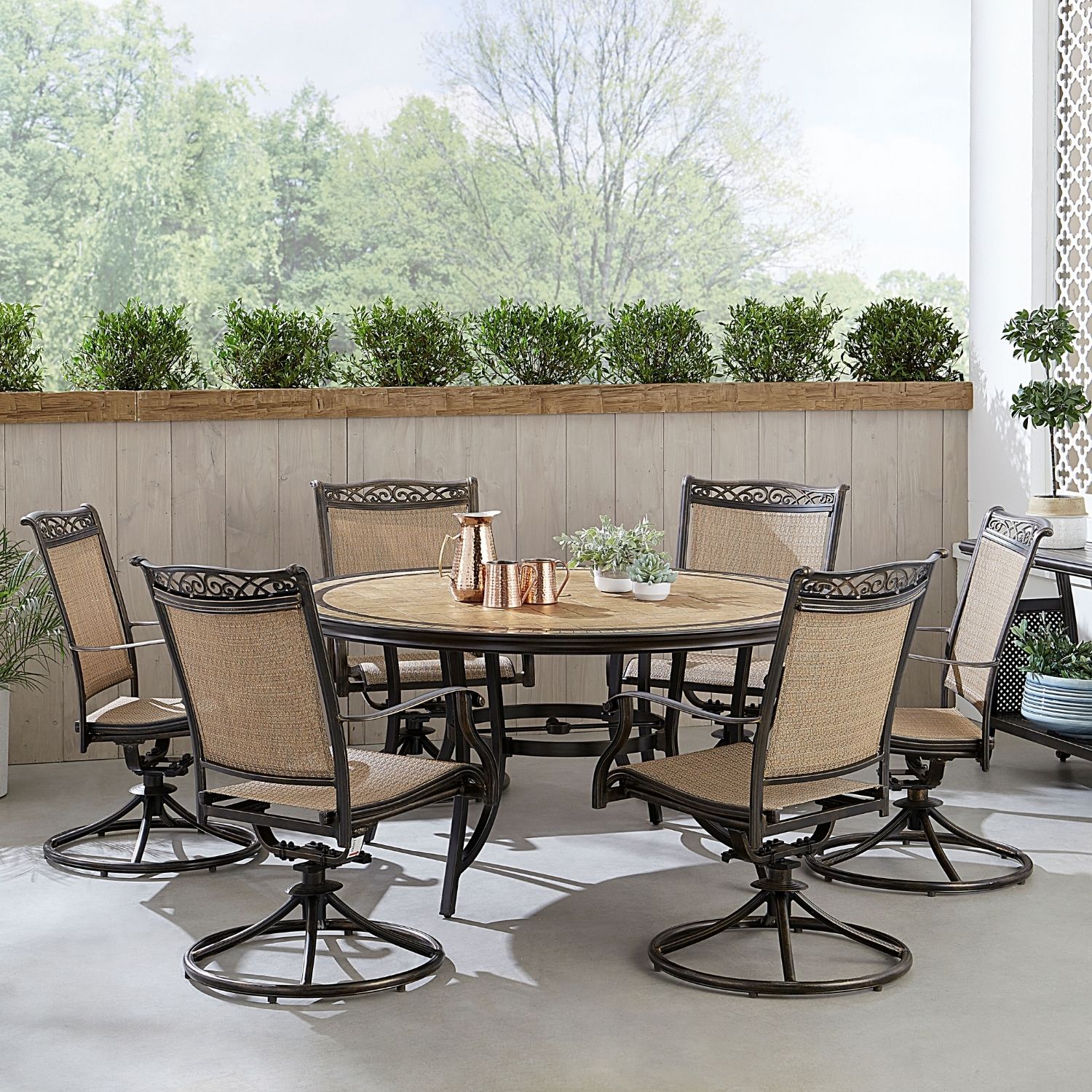 Hanover FNTDN7PCSW6RDTN Fontana 7 -Piece Bronze Patio Dining Set Aluminum Round Table with 6 Tan Swivel Rocker Chairs
