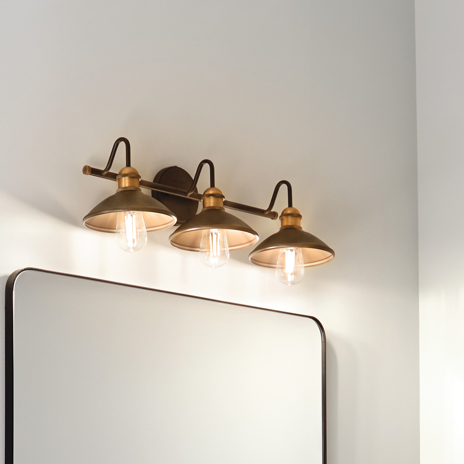 Kichler 45945OZ Clyde 26.25-in 3 -Light Antique Bronze Transitional Vanity light