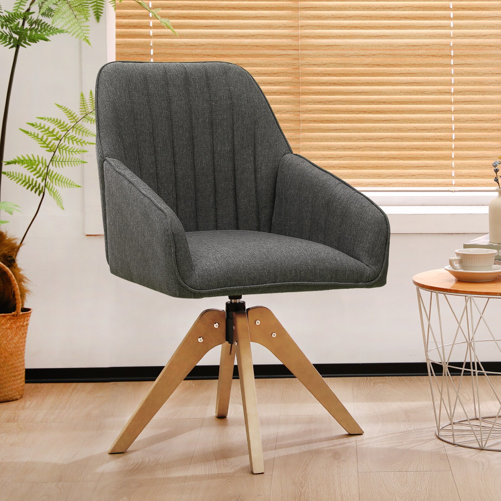 Gray swivel accent chair in a room