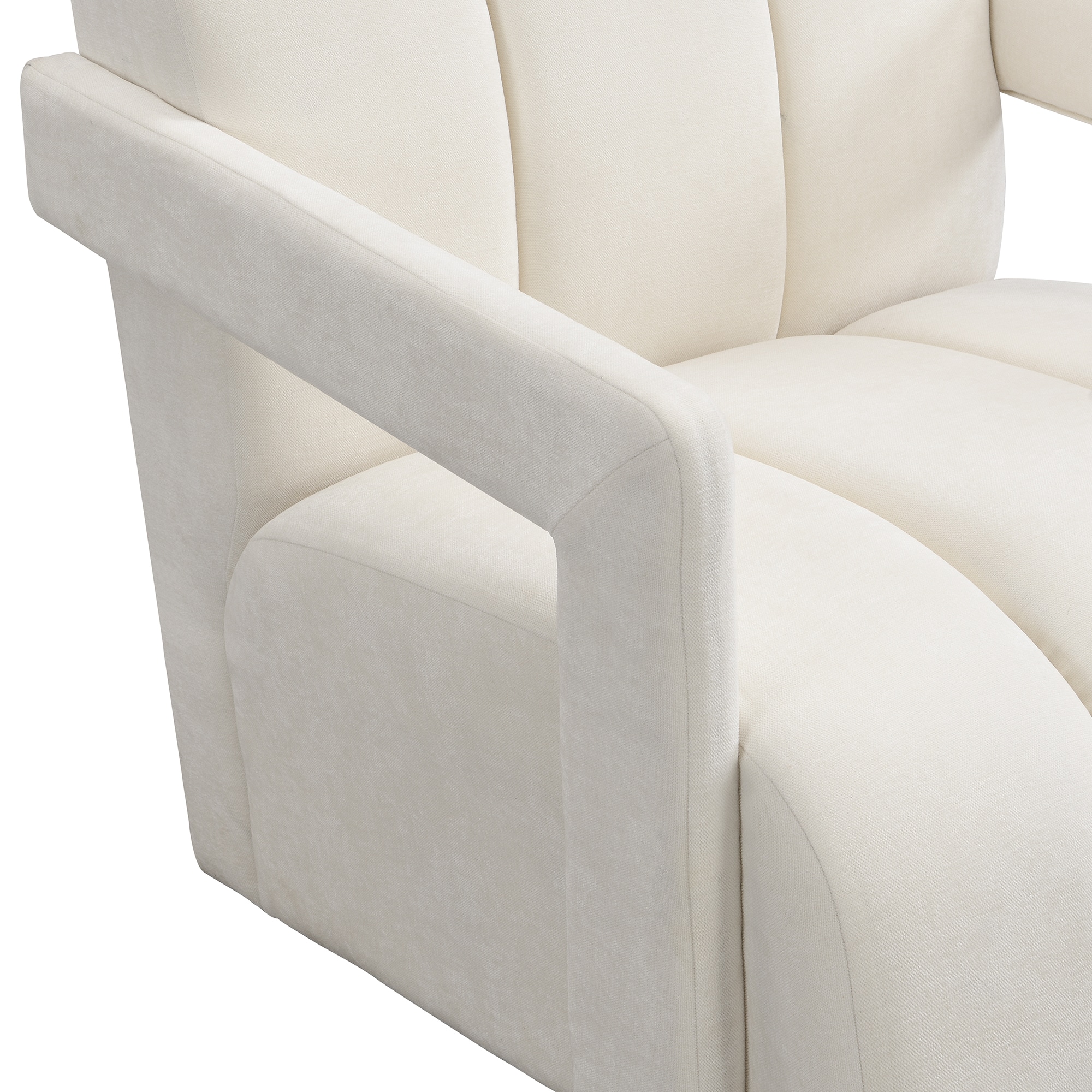 Close-up of armrest and upholstery texture on cream chair