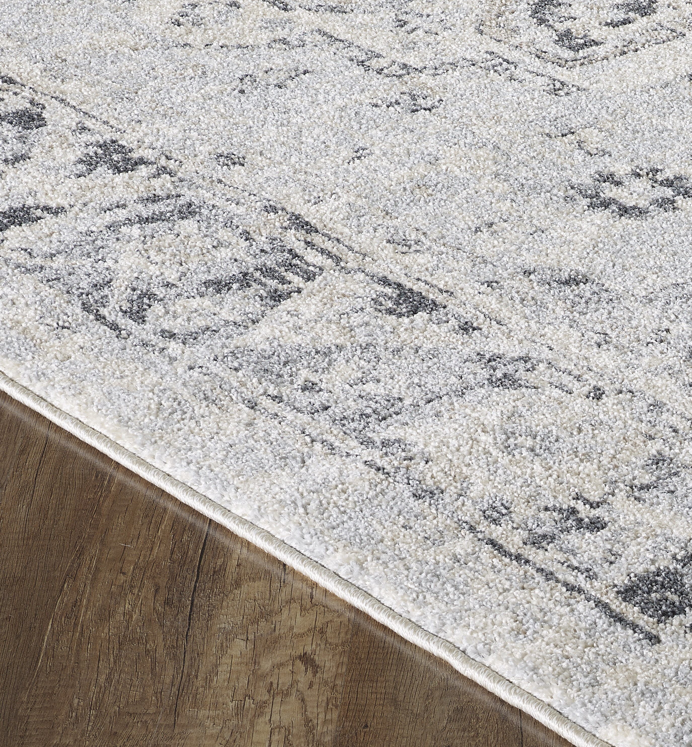 Gray and Cream 5' x 7' Reversible Oriental Synthetic Rug