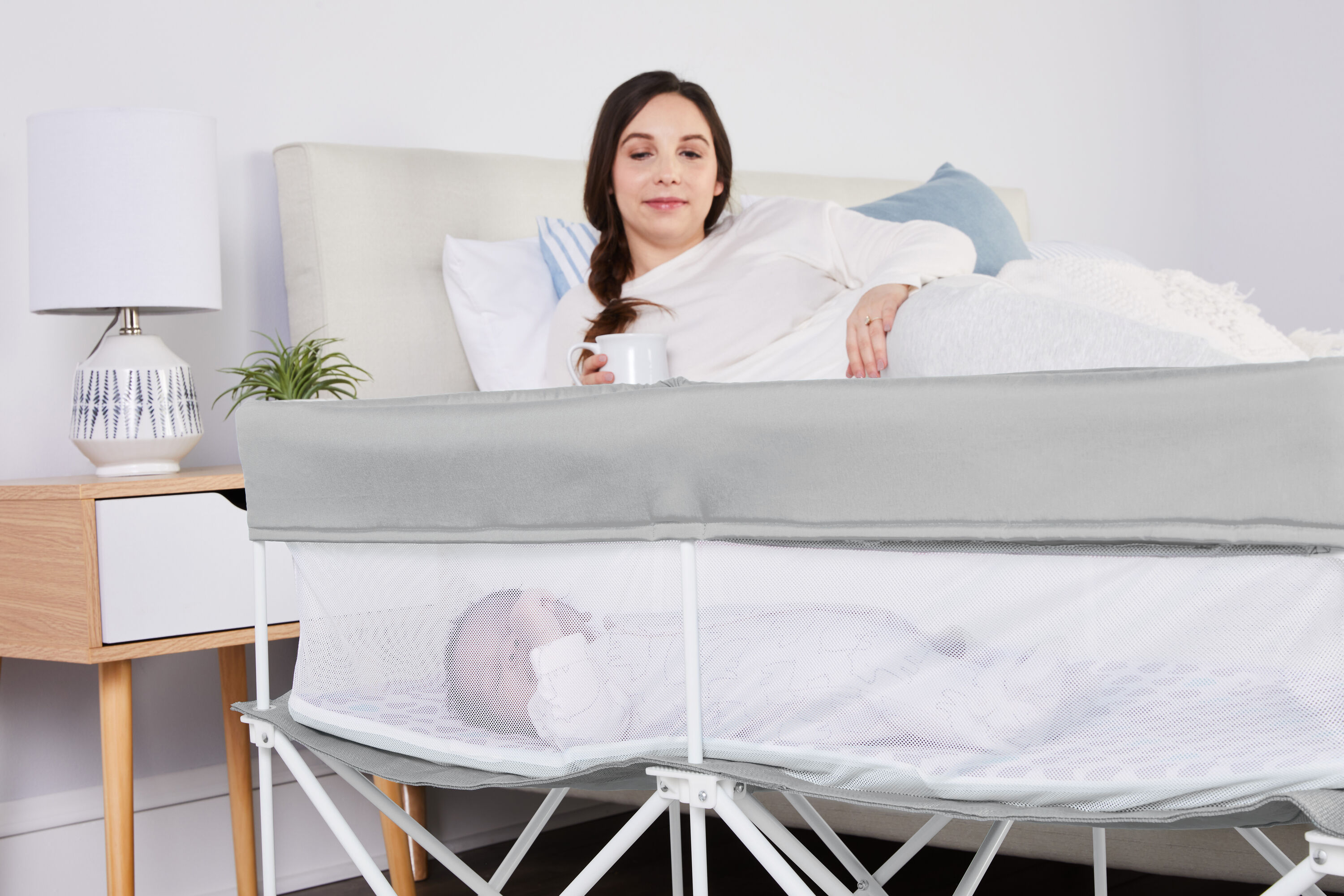 Gray Portable Infant Bassinet with Padded Insert
