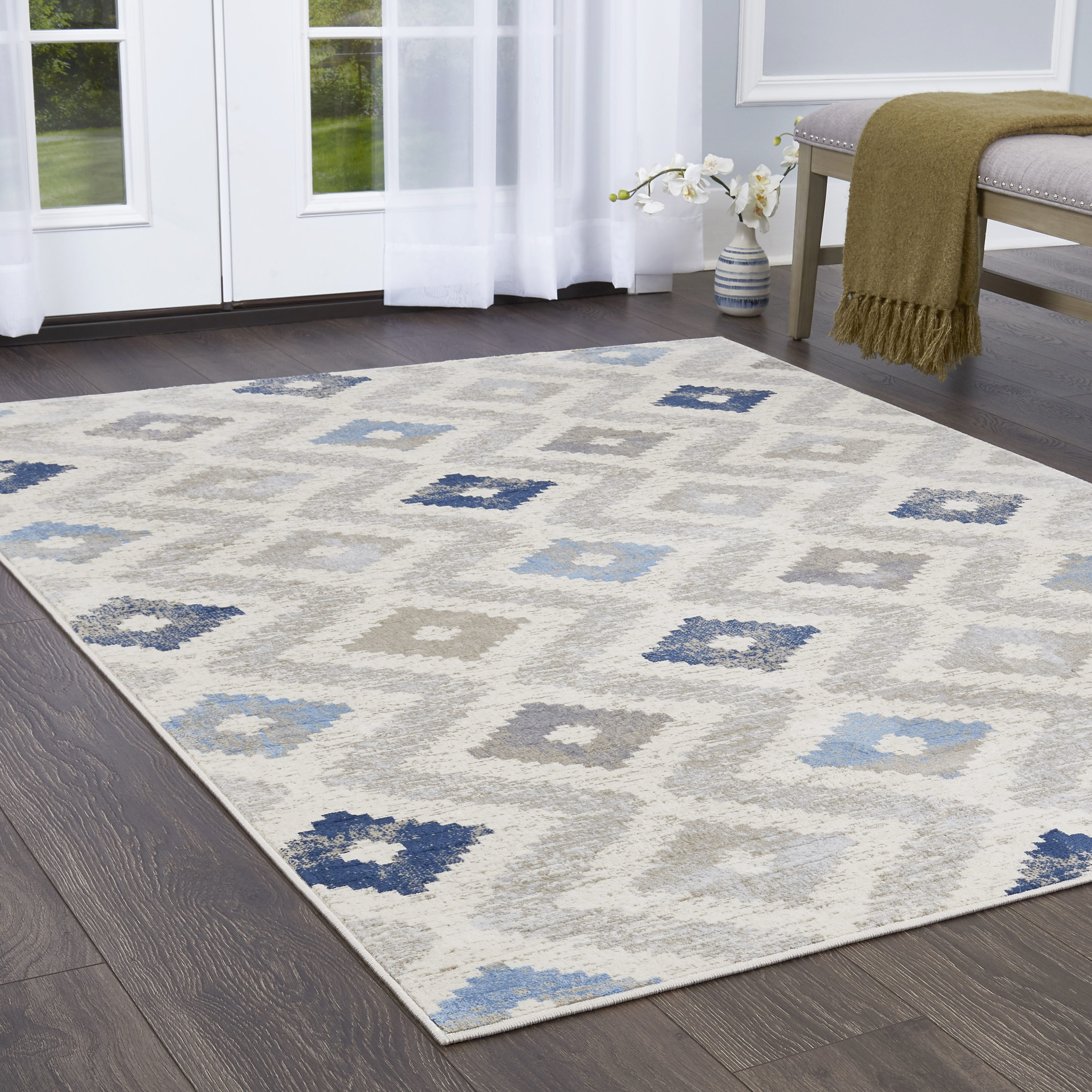 White and Blue Walk In Closet with Blue DIamond Pattern Rug - Transitional  - Closet