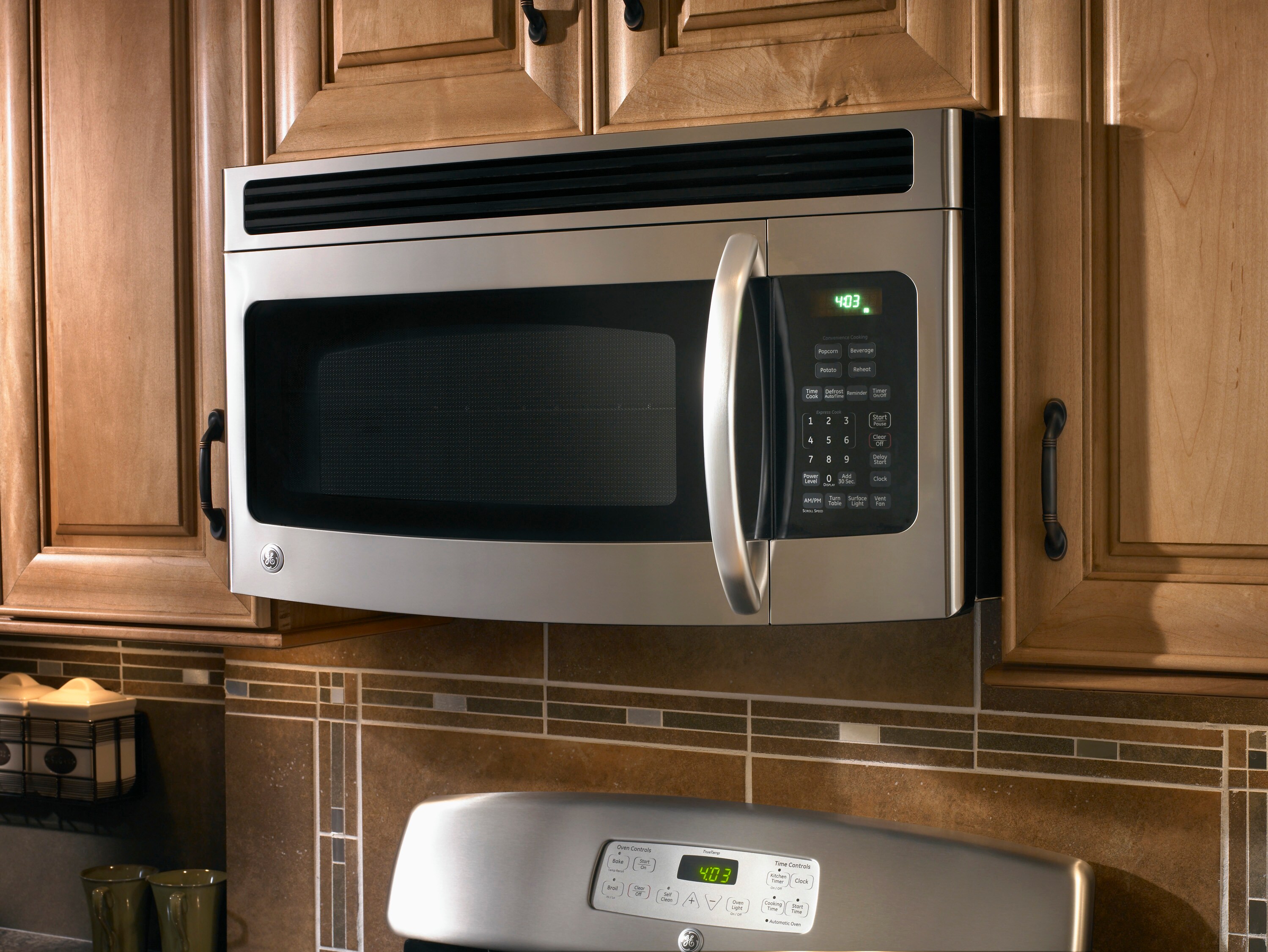 GE 1.5-cu ft 950-Watt Over-the-Range Microwave (Stainless Steel