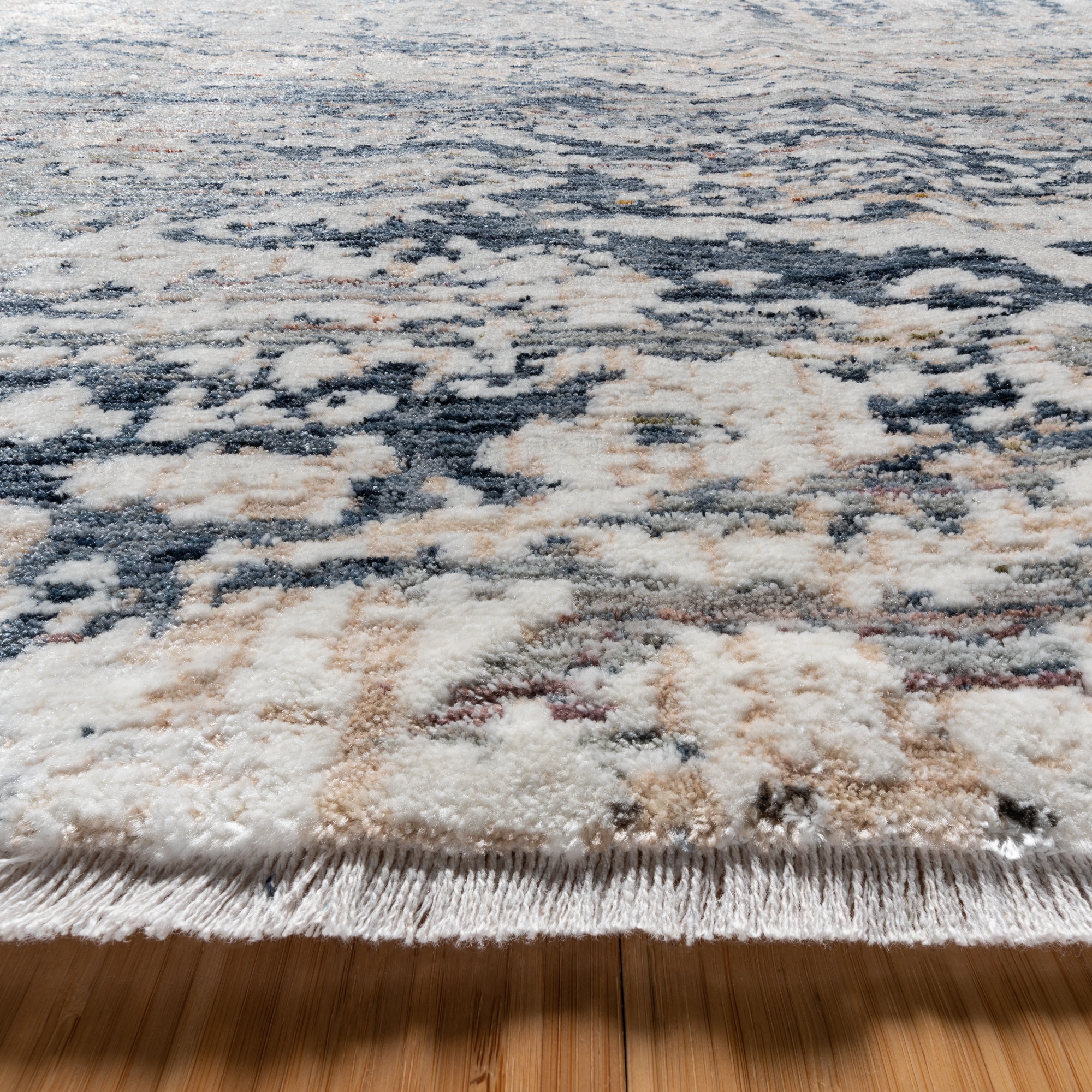 Damita Exton Blue and Beige 6' x 9' Abstract Area Rug