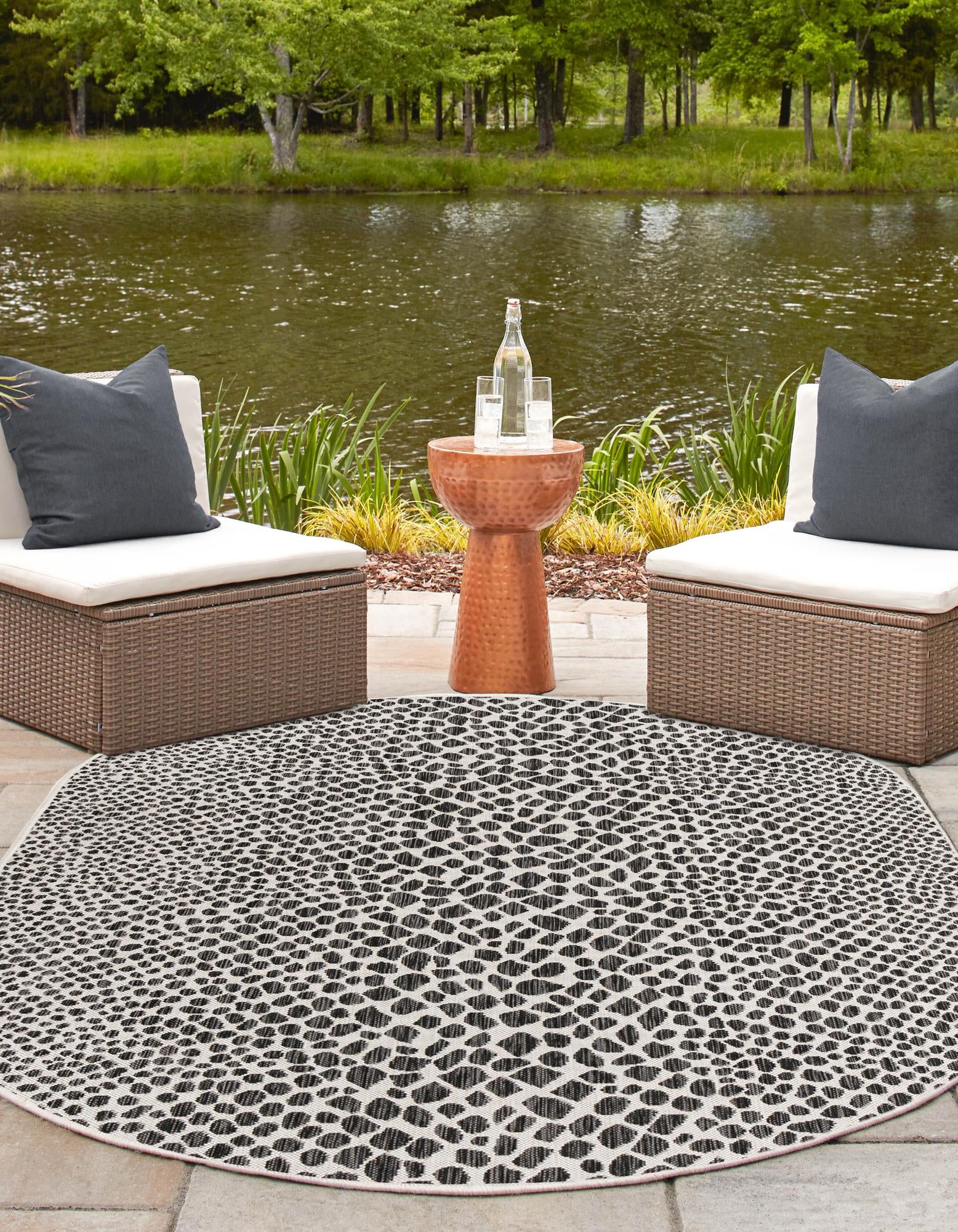 Unique Loom 3152805 Jill Zarin Cape Town 8 x 10 (ft) Loomed Polypropylene Black Oval Indoor/Outdoor Animal print Area rug