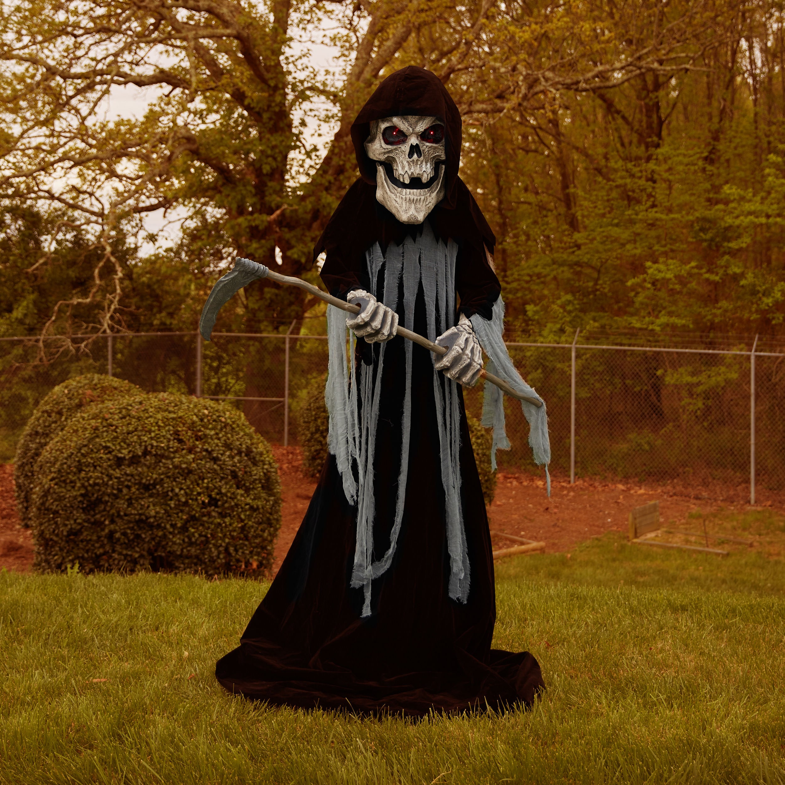 Haunted Living 4-ft Animatronic Bluetooth Reaper with Band Drums at