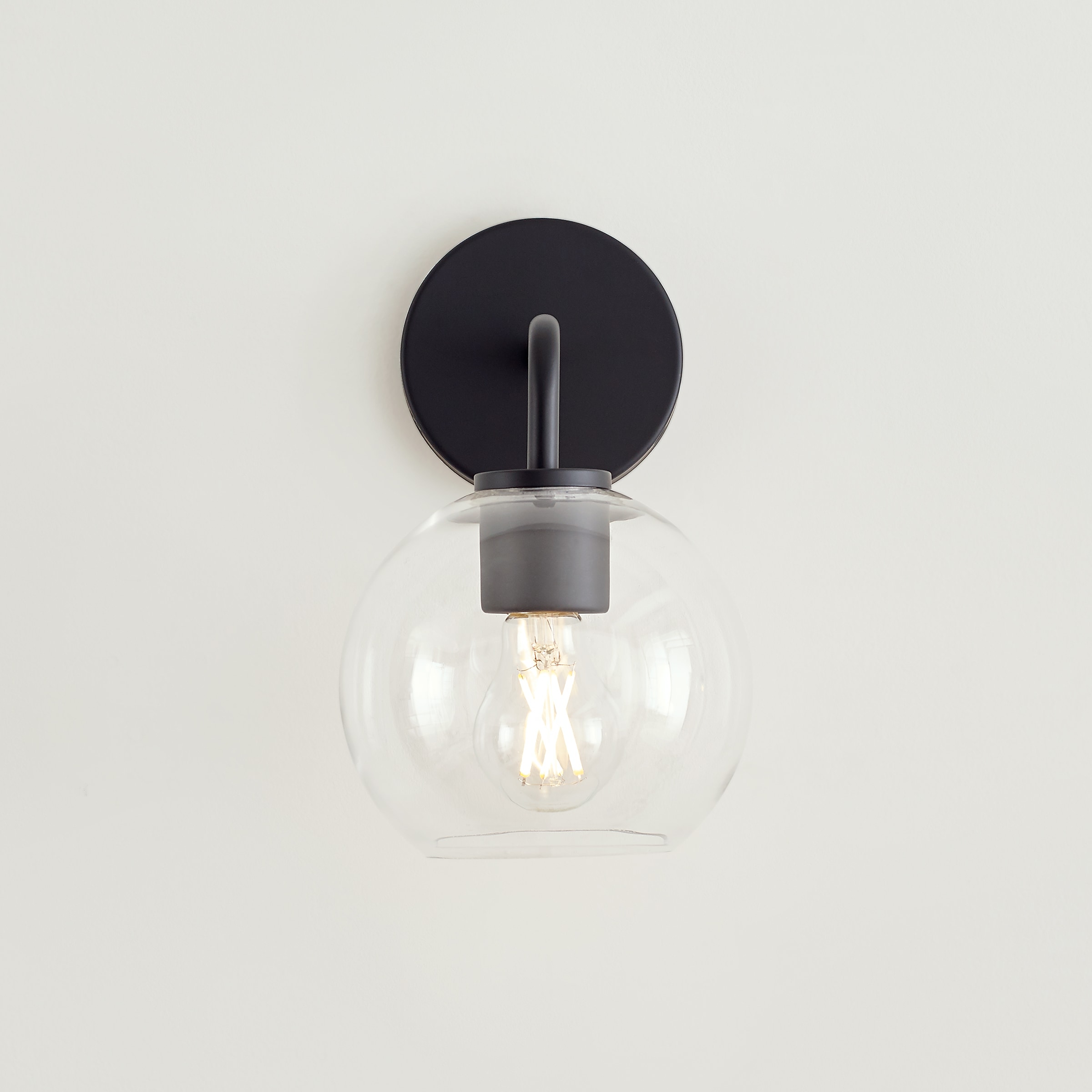 Orley Matte Black Geometric Wall Vanity with Clear Glass Shade