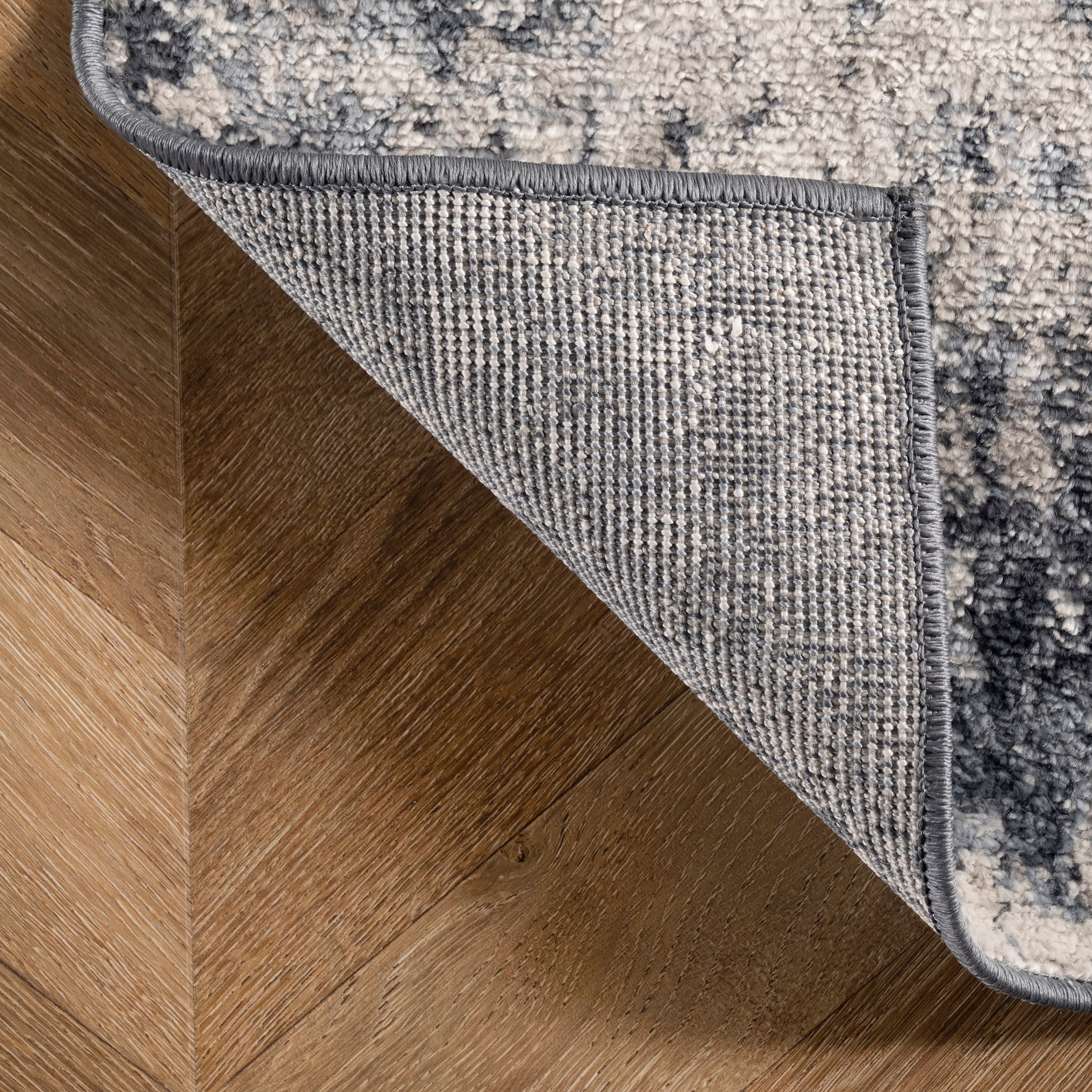 Reversible Abstract Blue Synthetic 4' x 6' Easy-Care Area Rug