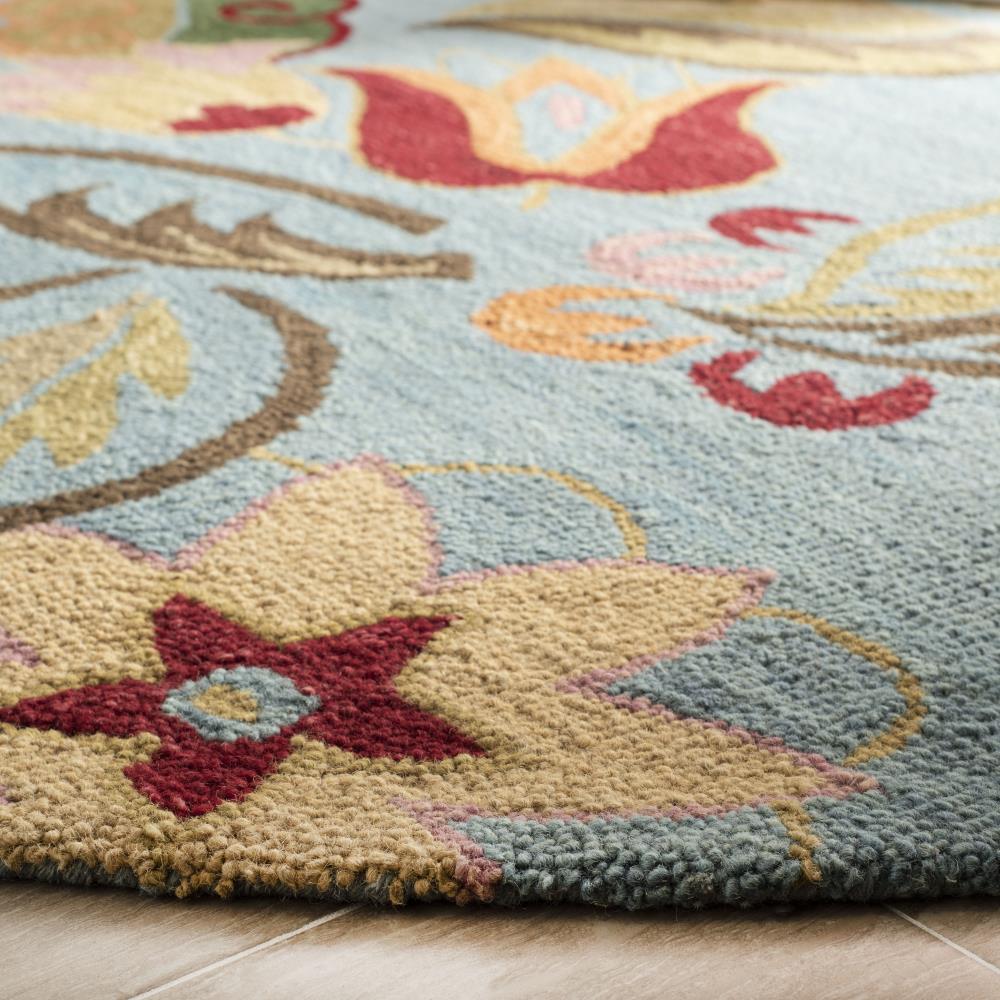 Handmade Blue Floral Tufted Wool Round Rug