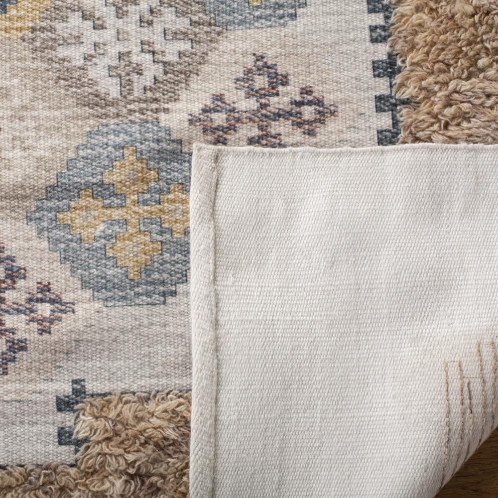 Ivory and Taupe Hand Loomed Wool Area Rug