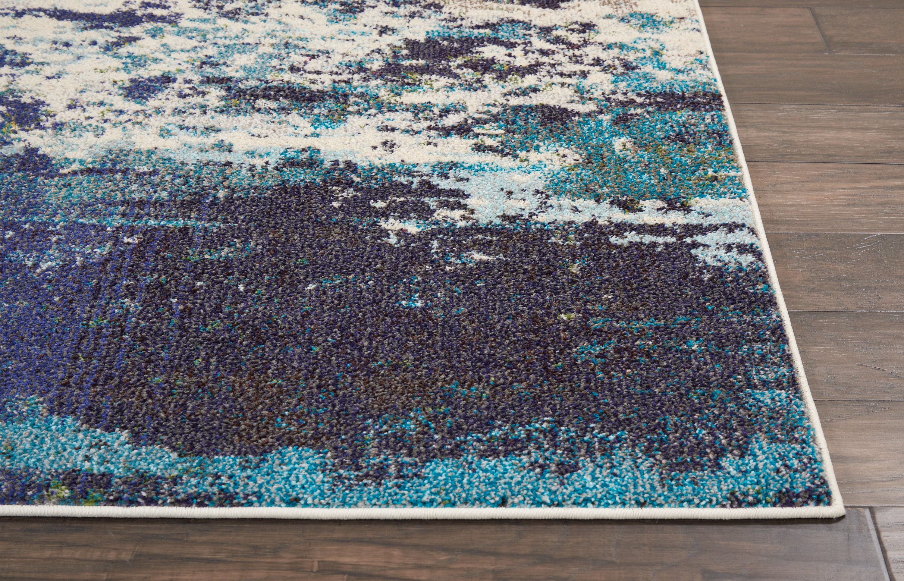 Reversible 5' x 7' Blue Abstract Synthetic Stain-Resistant Rug