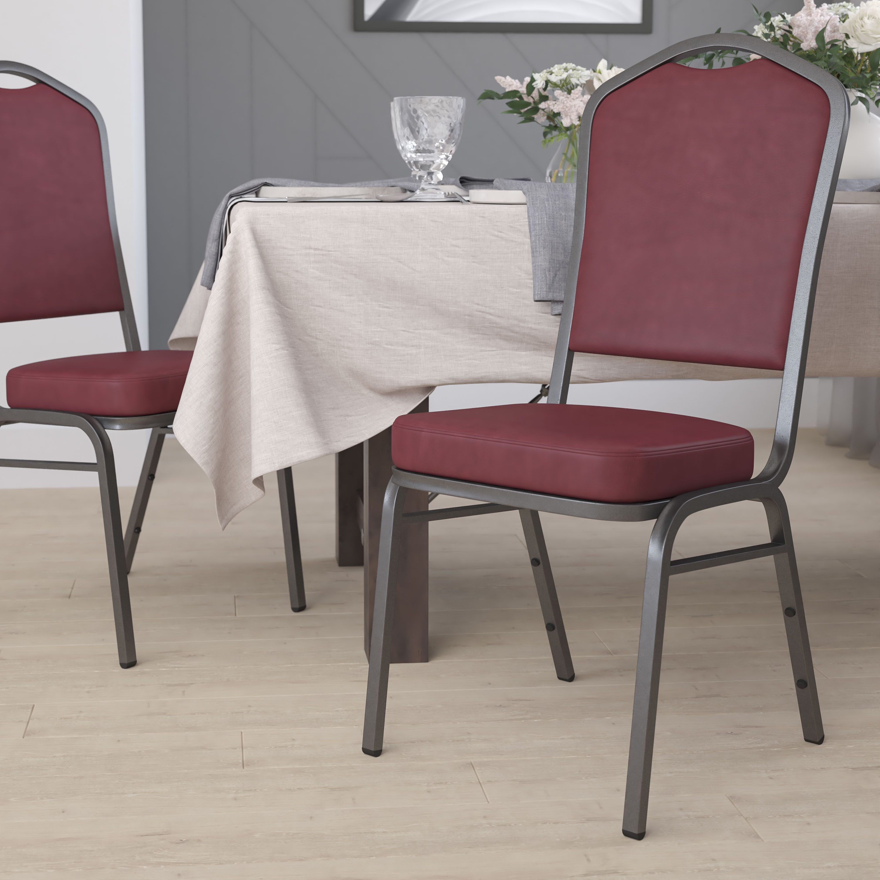 Elegant Burgundy Vinyl Stacking Chair with Silver Vein Metal Frame