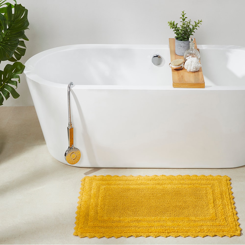 Better Trends 40-in x 24-in Yellow Cotton Bath Rug in the Bathroom