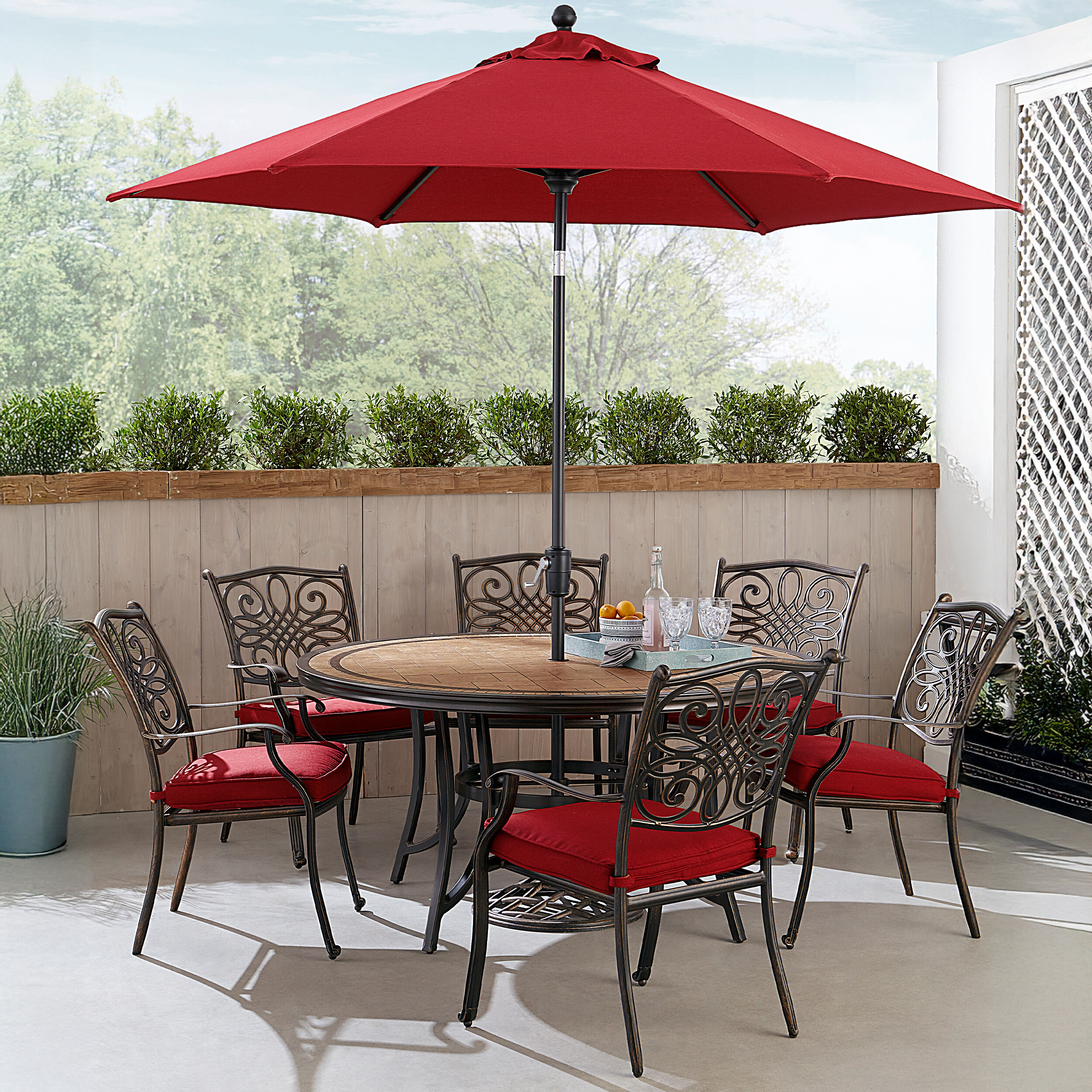 Hanover MONDN7PCRDTLC-SU-R 8 -Piece Bronze Patio Dining Set Aluminum Round Table with 6 Red Cushions Stationary Chairs and Umbrella Included