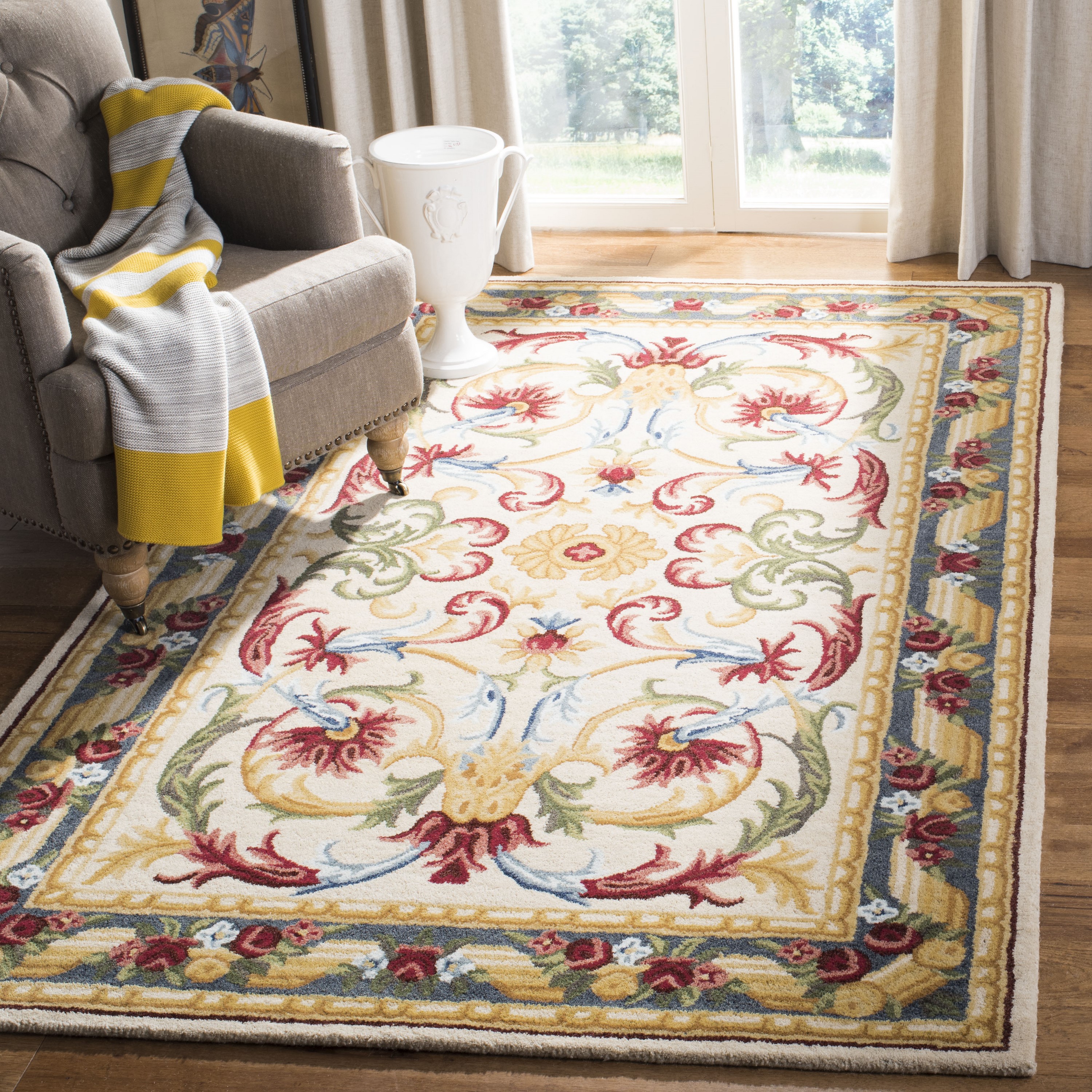 Handmade Ivory Floral Tufted Wool Area Rug 5' x 8'