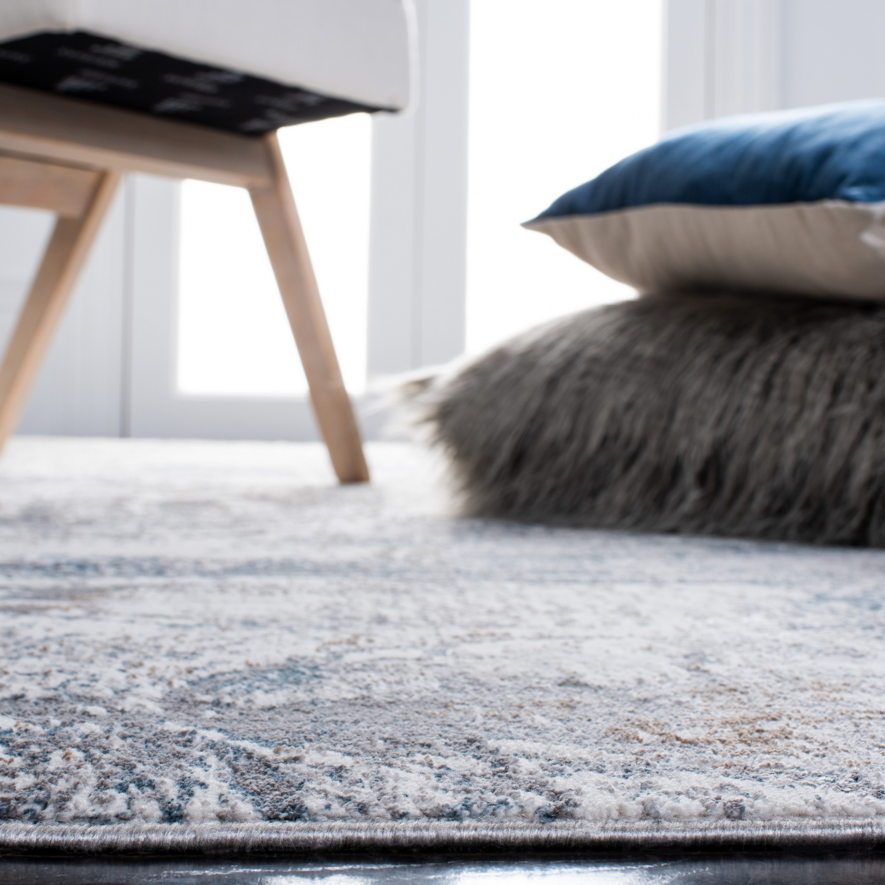Ivory Abstract 9' x 12' Synthetic Easy Care Area Rug