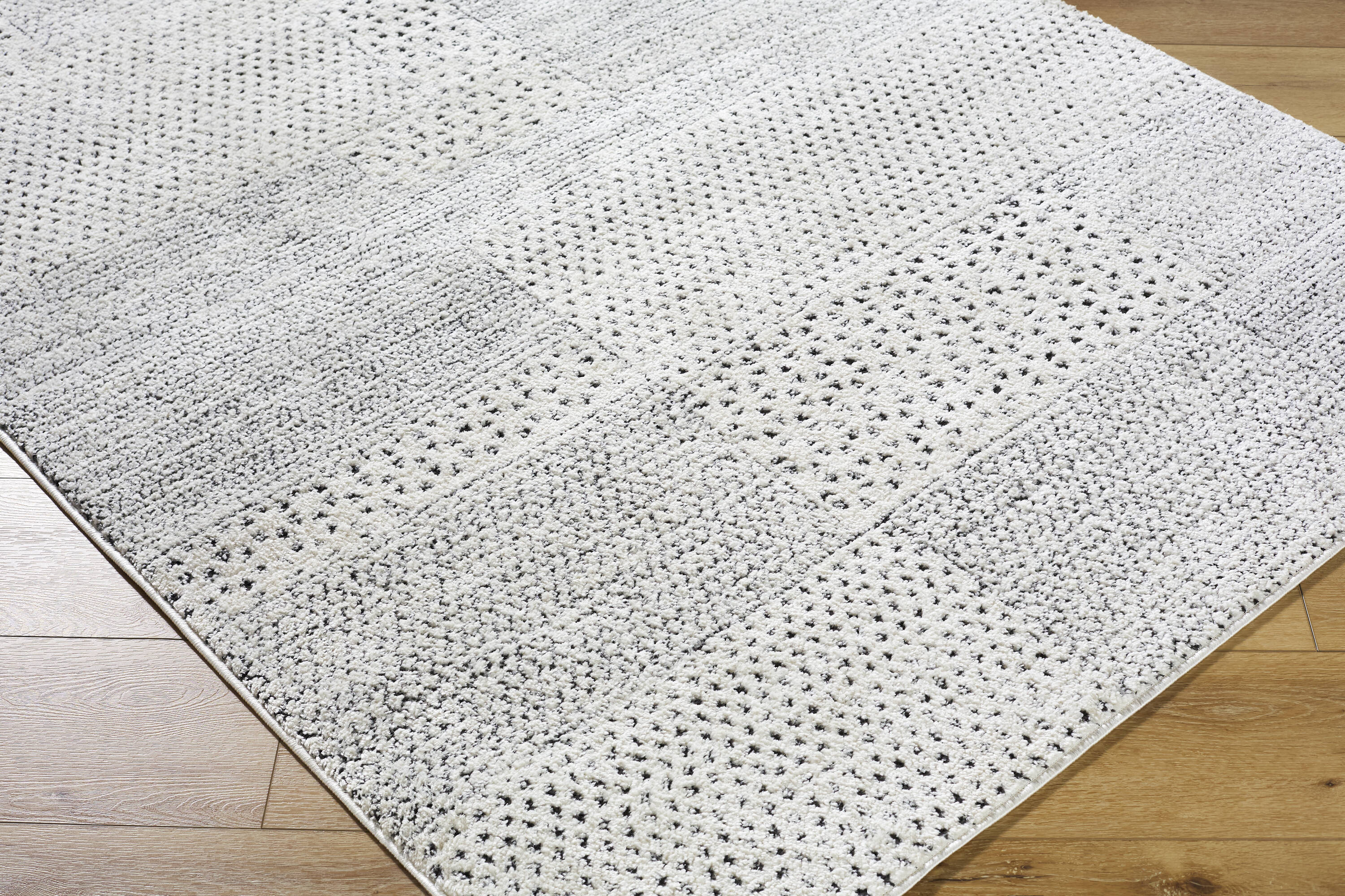 Ivory and Black Geometric Polyester Runner Rug