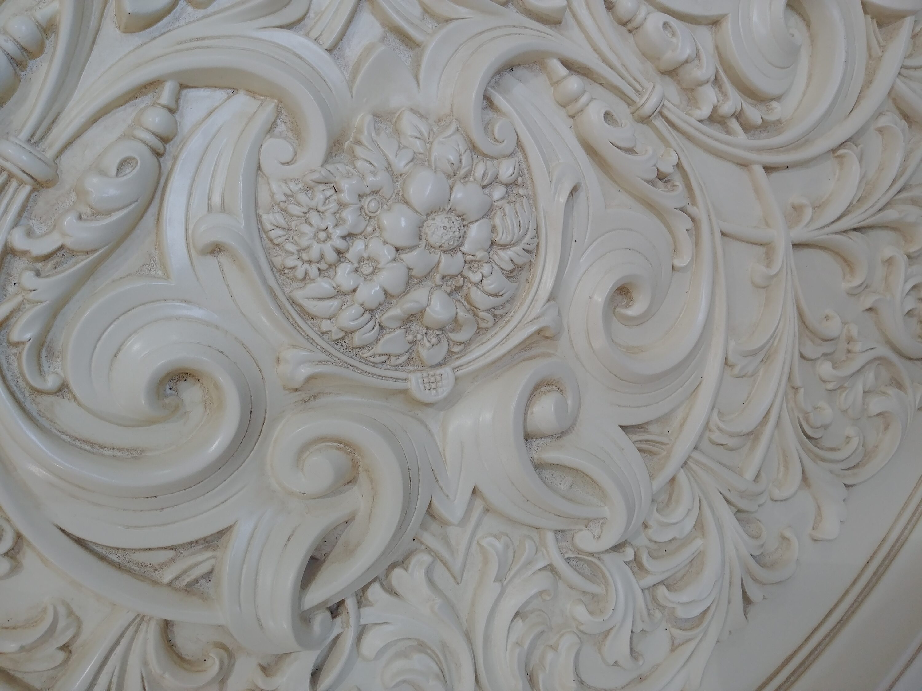 Alluring Carve Cream Round Ceiling Medallion
