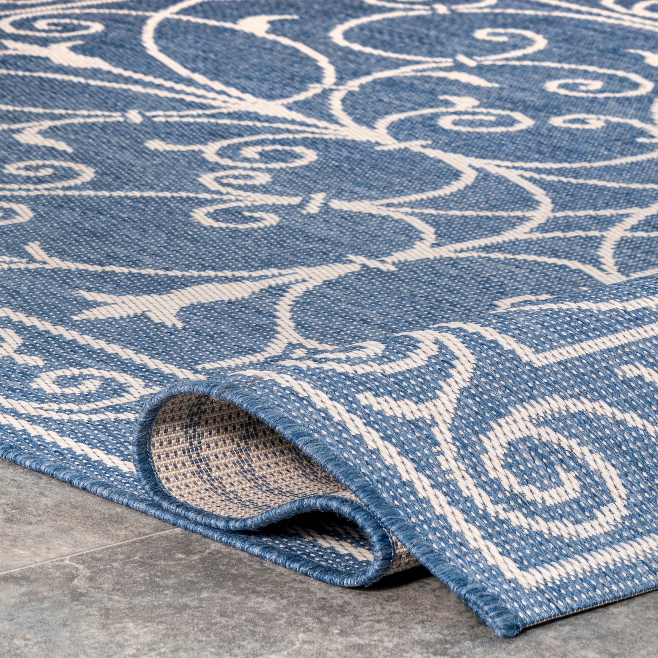 Kathleen Blue and White Synthetic 6' x 9' Rectangular Area Rug