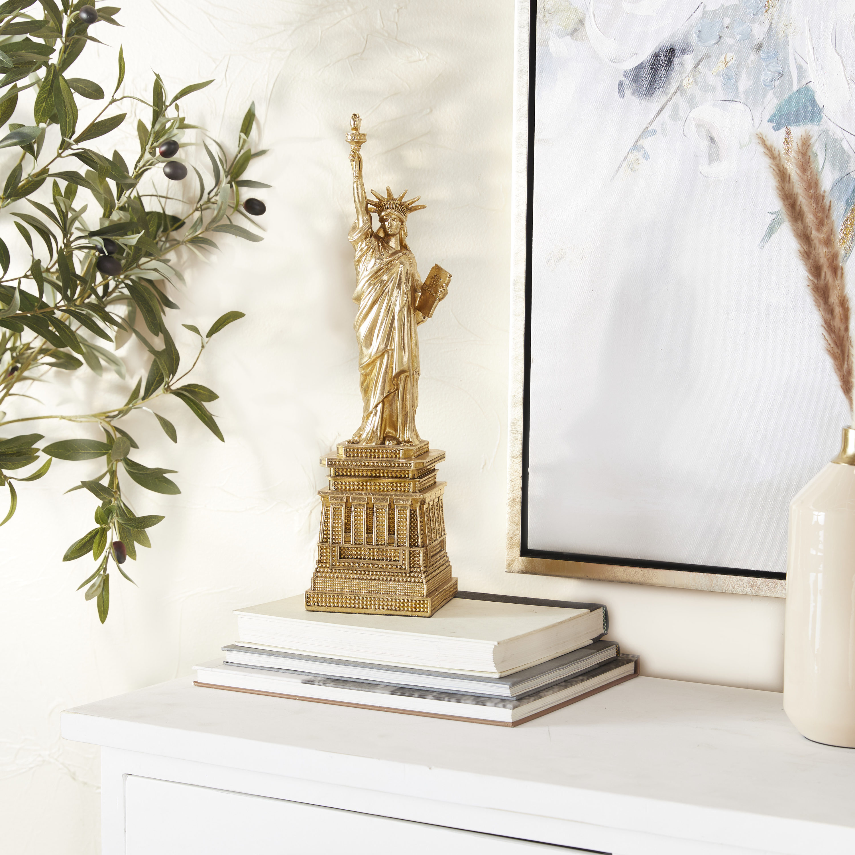 The Novogratz 67584 Gold Resin/Stone Rustic Sculpture