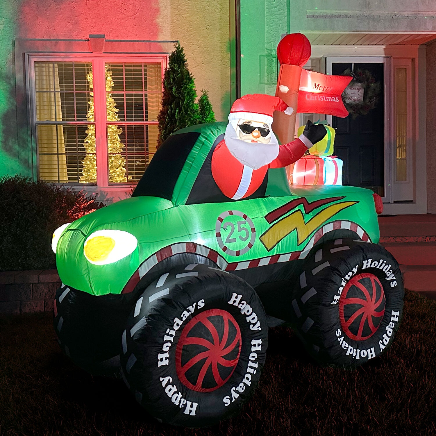6-Ft Tall Pre-lit Santa in Green Monster Truck Inflatable
