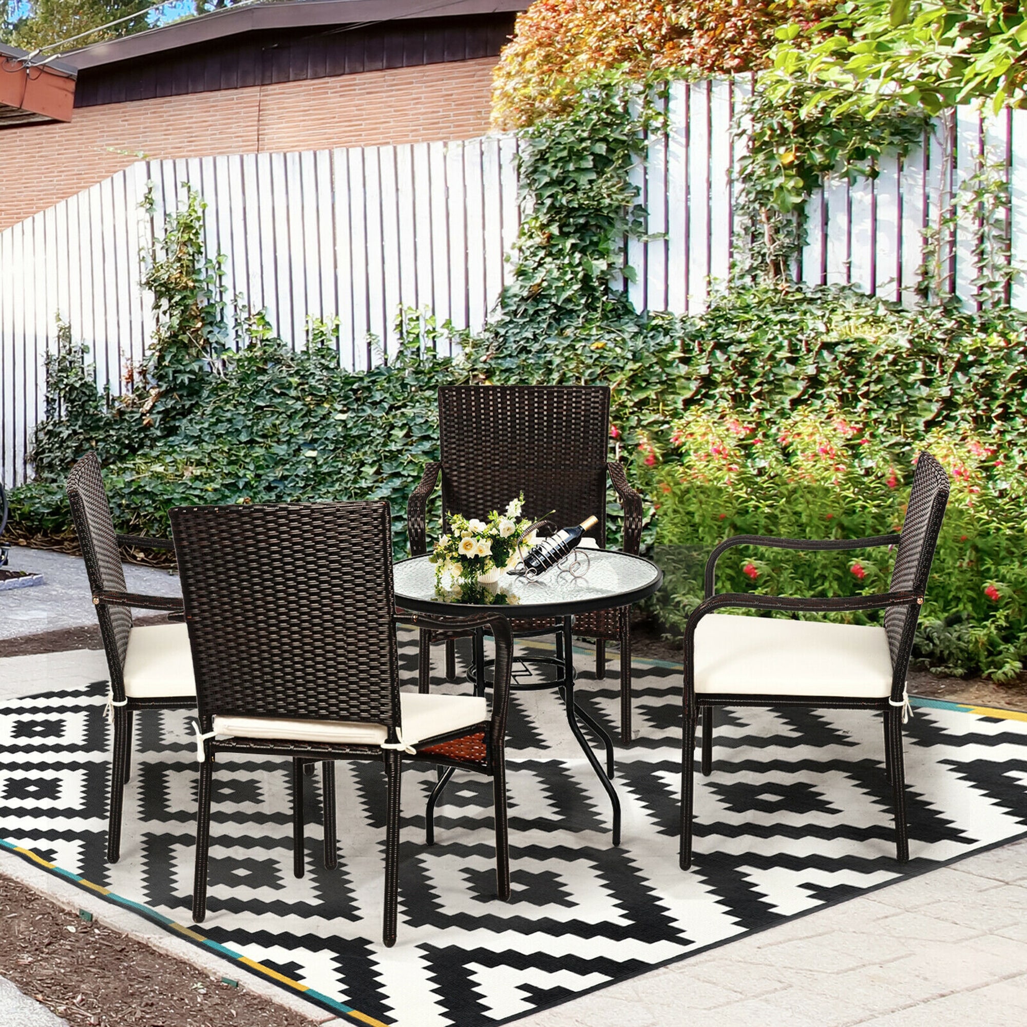 Set of 4 Brown Rattan Dining Chairs with Off-White Cushions