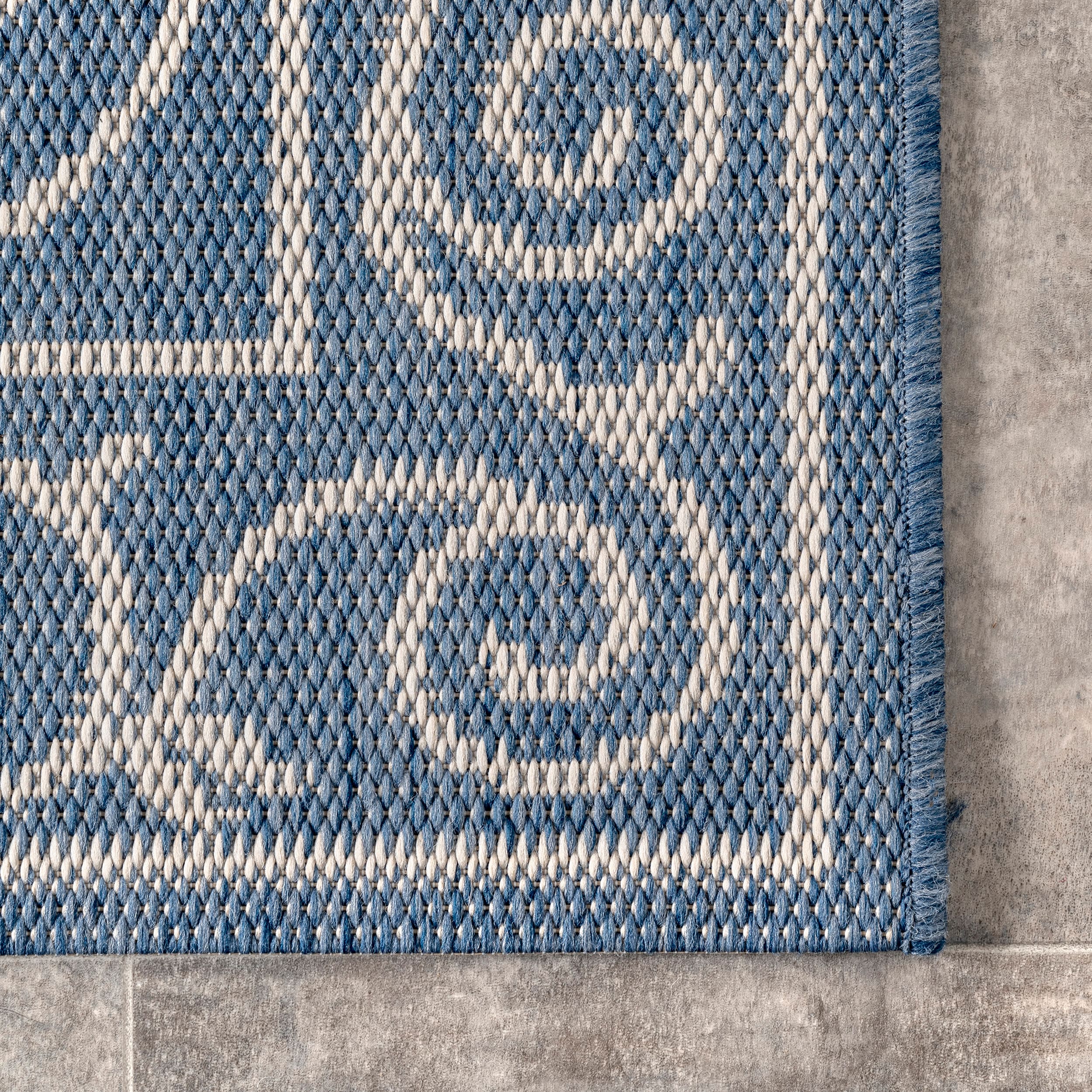 Kathleen Blue and White Synthetic 6' x 9' Rectangular Area Rug