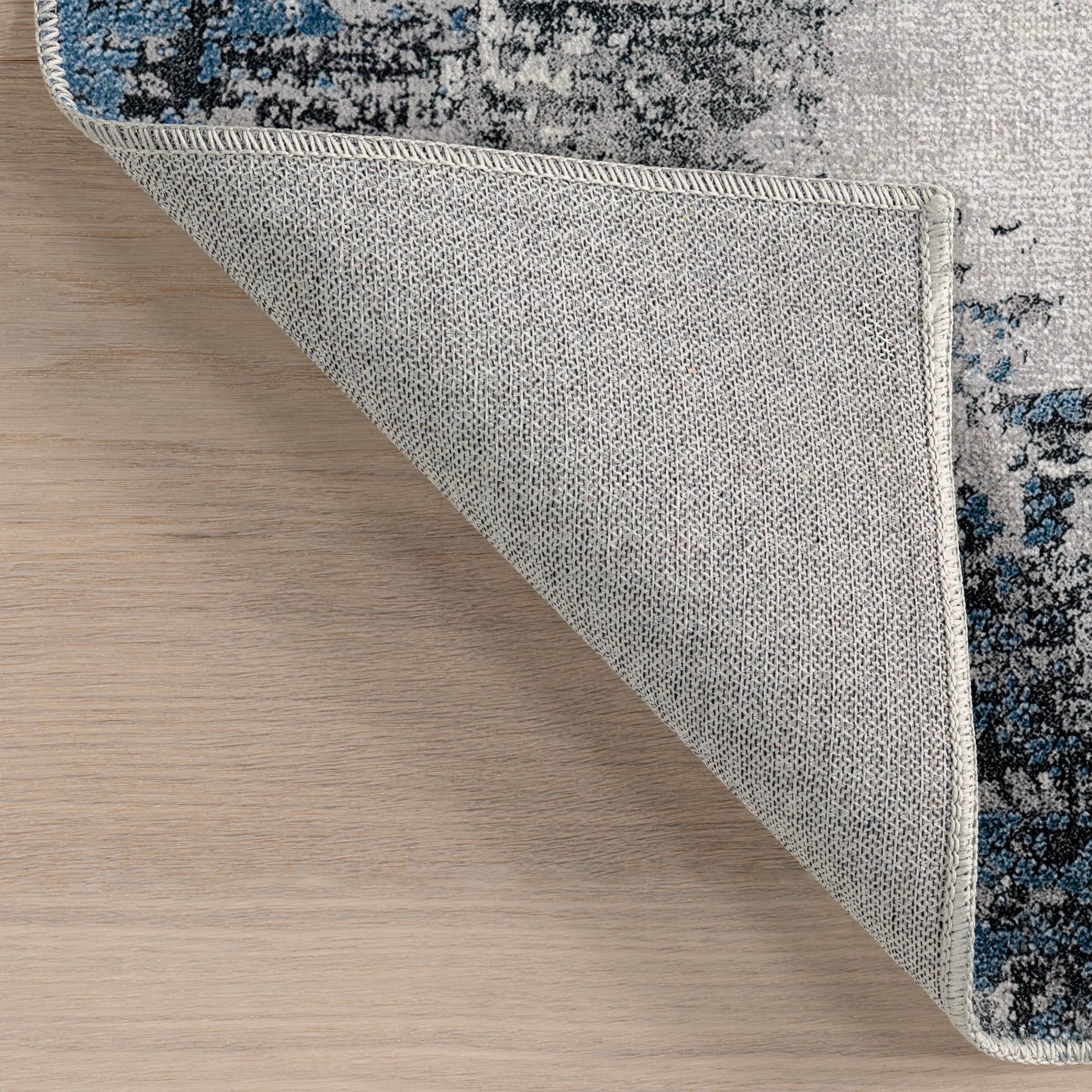 Reversible Abstract Gray Synthetic 4' x 6' Easy-Care Area Rug
