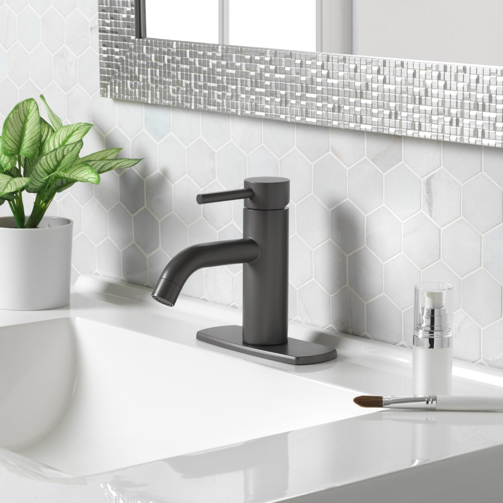 Project Source BPS-102-GM Larton Gun Metal Single hole 1-handle WaterSense Mid-arc Residential Handle Bathroom Sink Faucet with Drain with Deck Plate