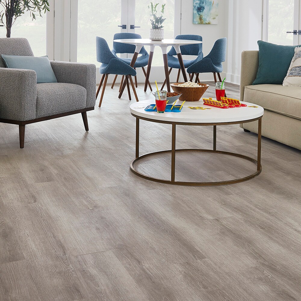 STAINMASTER PetProtect Trelawney Grey Oak 20-mil x 7-in W x 48-in L  Interlocking Luxury Vinyl Plank Flooring (19.22-sq ft/ Carton) in the Vinyl  Plank department at