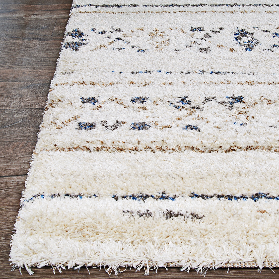 Ivory and Caramel Wool Synthetic Shag Area Rug