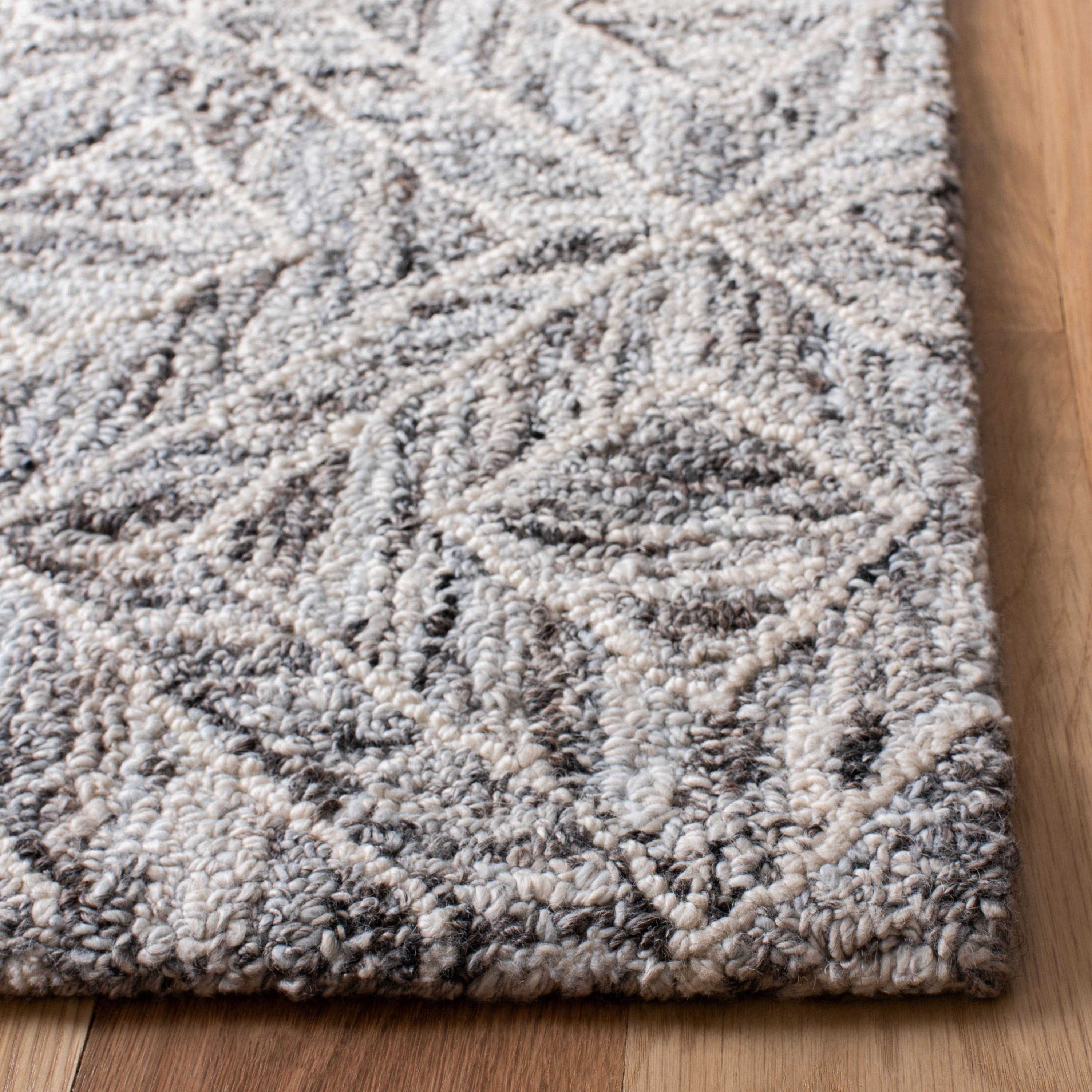 Handmade Abstract Gray and Beige Tufted Wool Rug - 27" x 7"