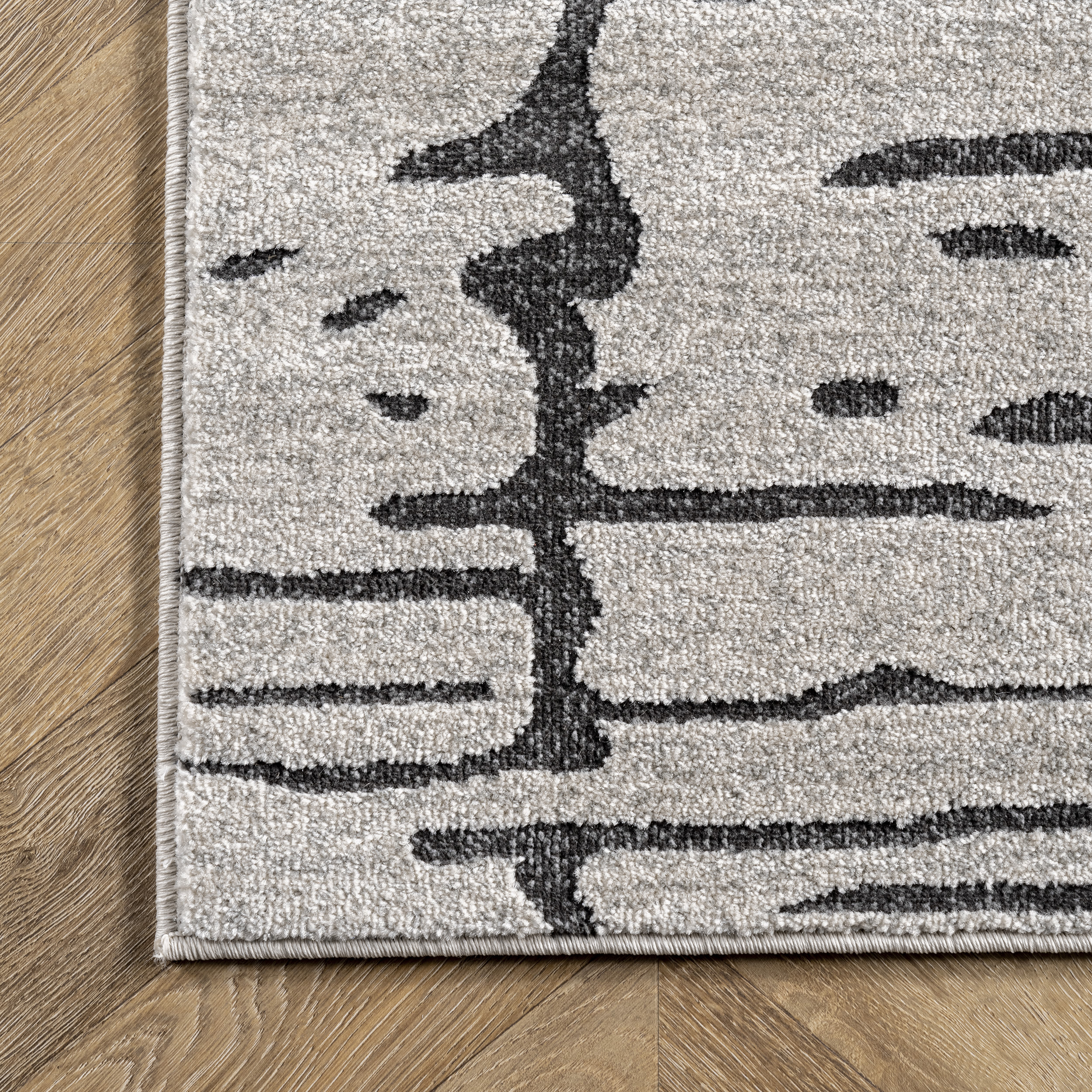 Ivory Tufted Reversible Abstract Synthetic 4' x 6' Area Rug