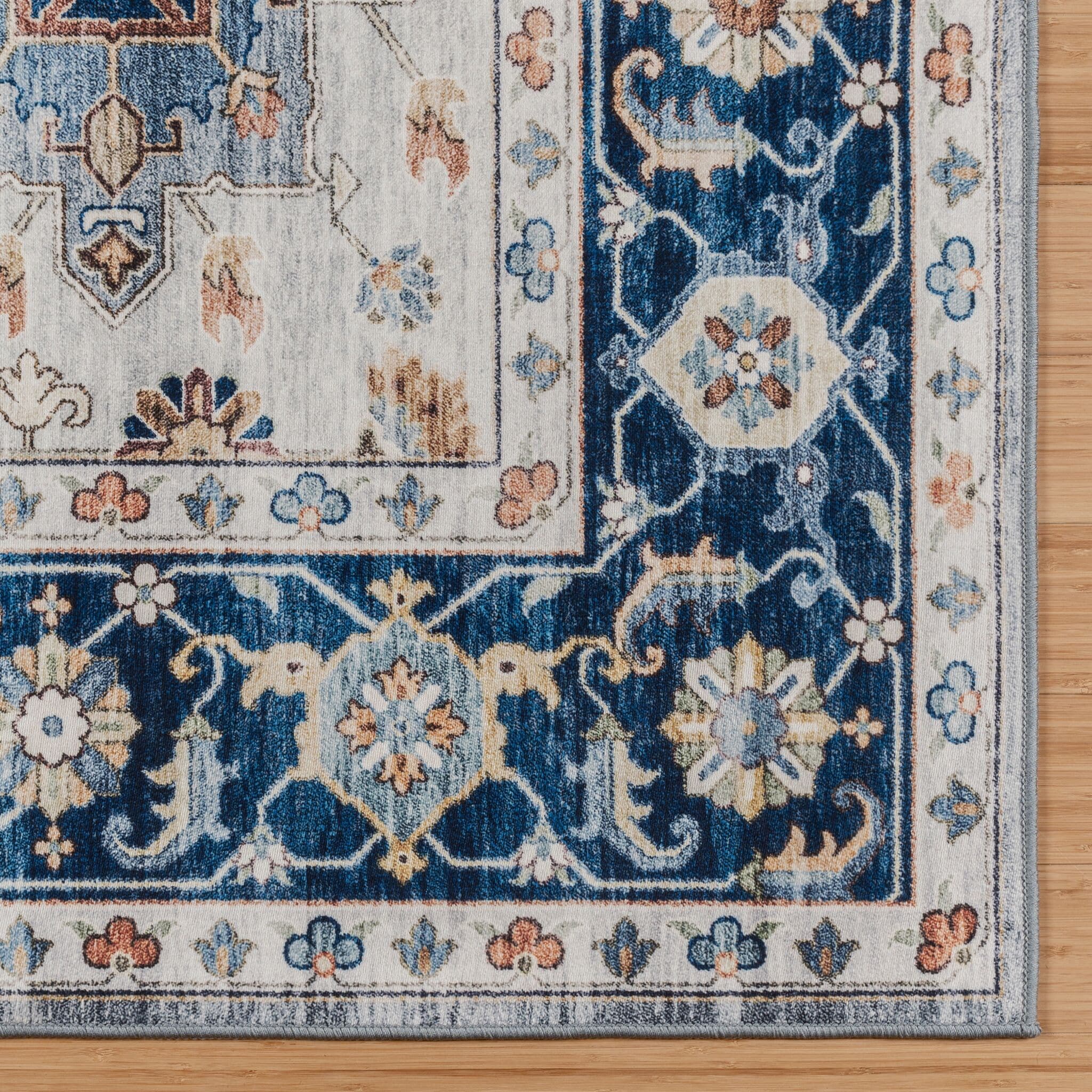 Micah Blue and Ivory Traditional Washable 6' x 9' Area Rug