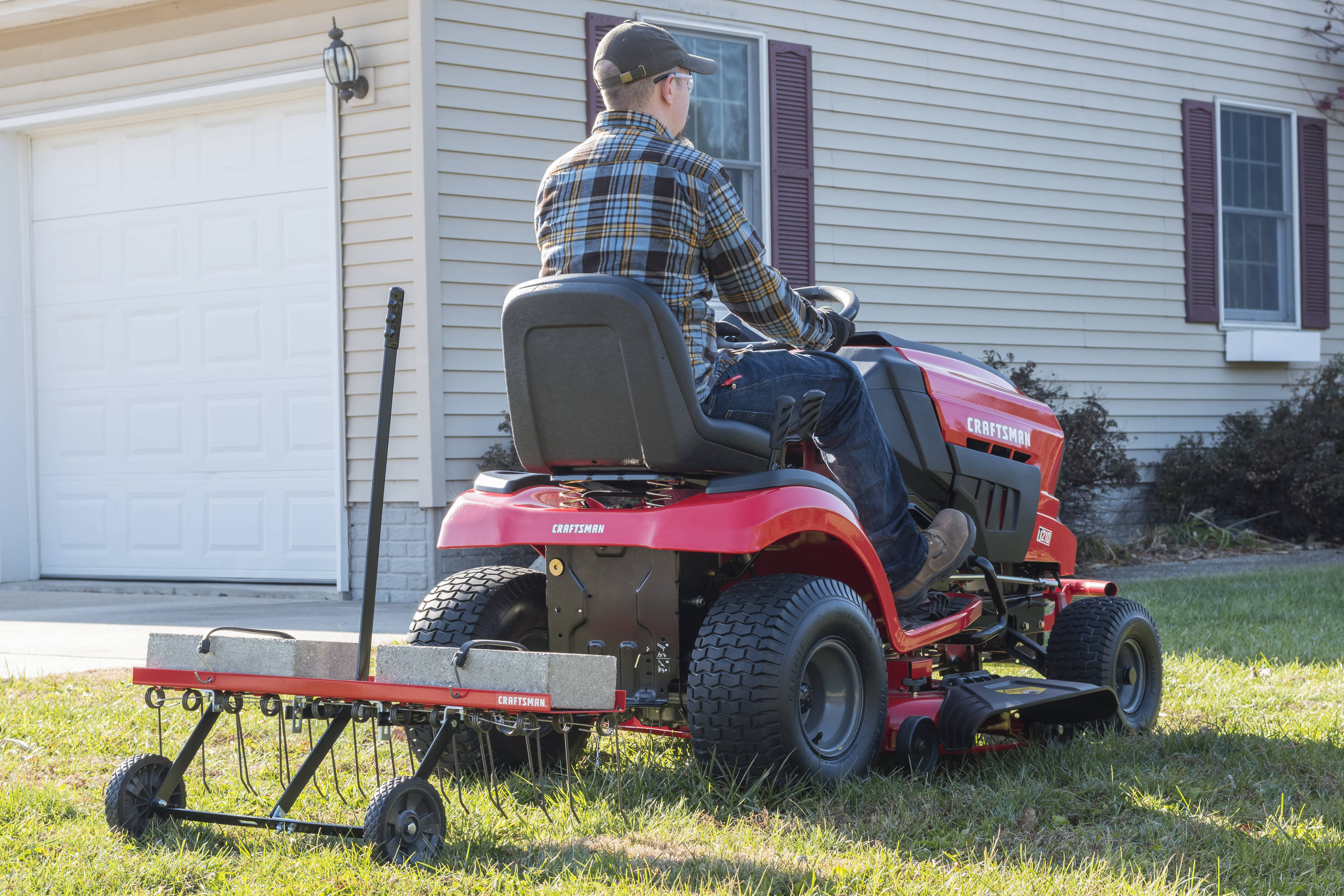 Image of Craftsman riding mower rake attachment