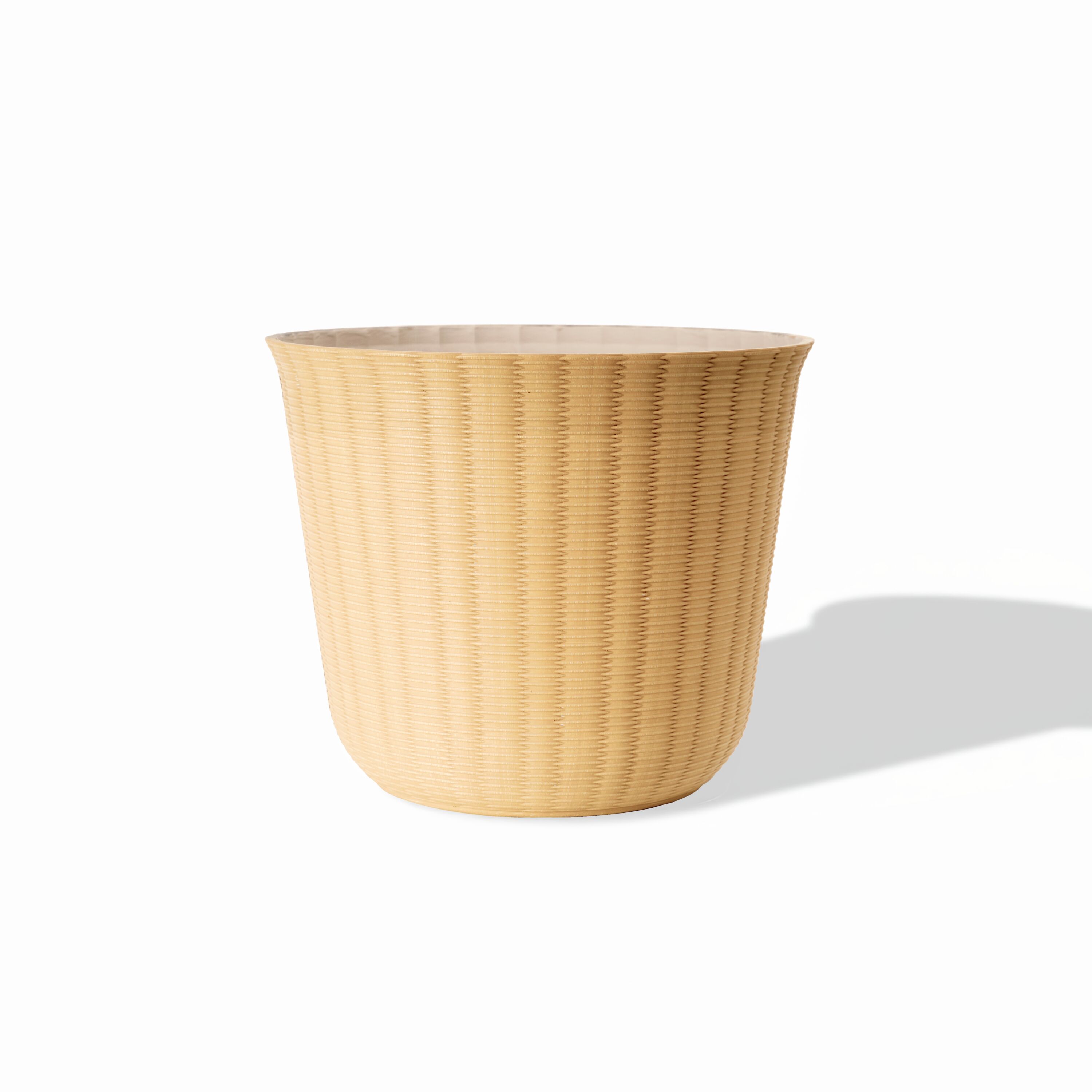 Style Selections DP2151P Round 11.0-in W x 9.49-in H x Yellow Recycled plastic Indoor/Outdoor Planter