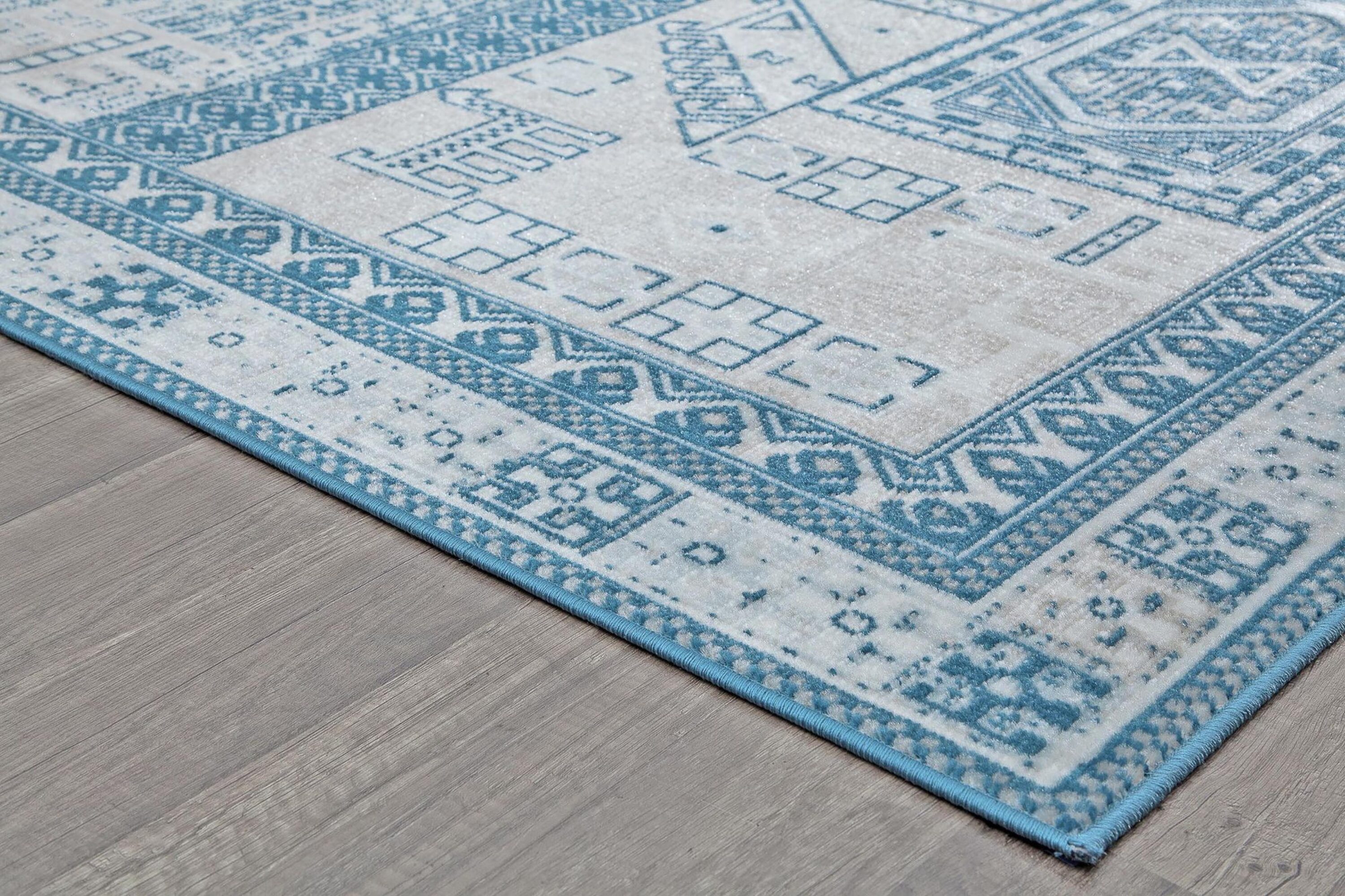 Azure Elegance 5' x 7' Reversible Blue Synthetic Area Rug
