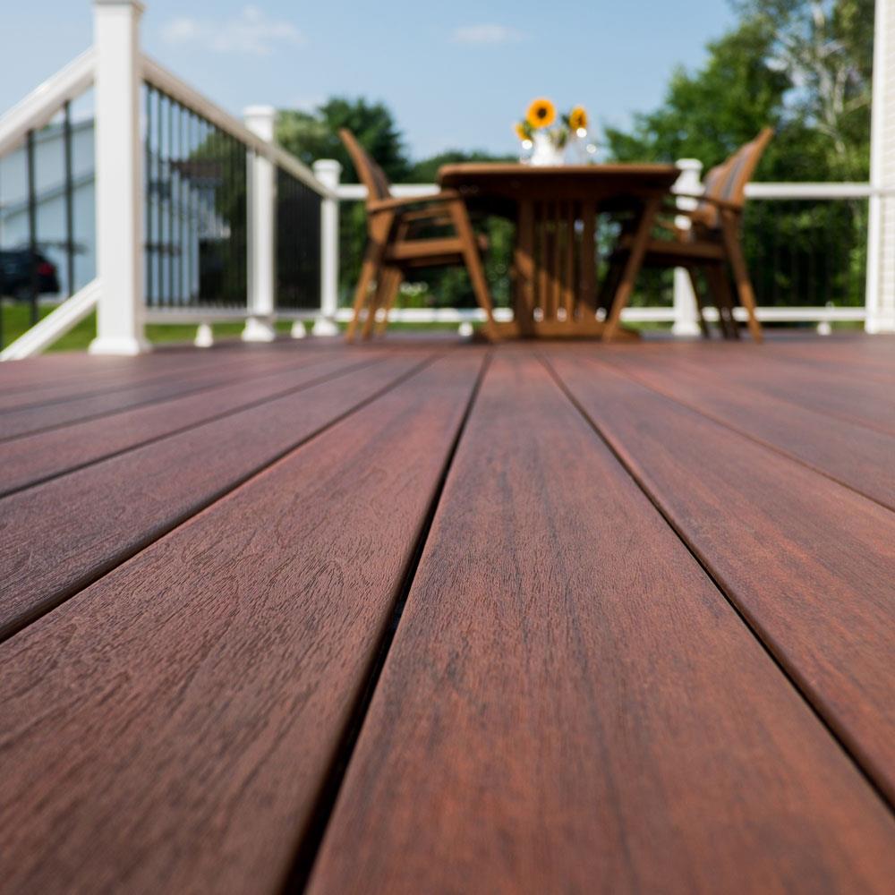 Wood-plastic composite deck board - SYMMETRY - fiberon LLC - wood look /  grooved / sustainable