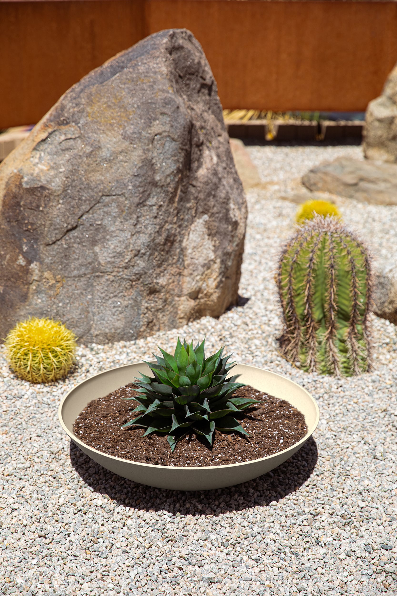Sandstone 24" Round Plastic-Stone Indoor/Outdoor Planter