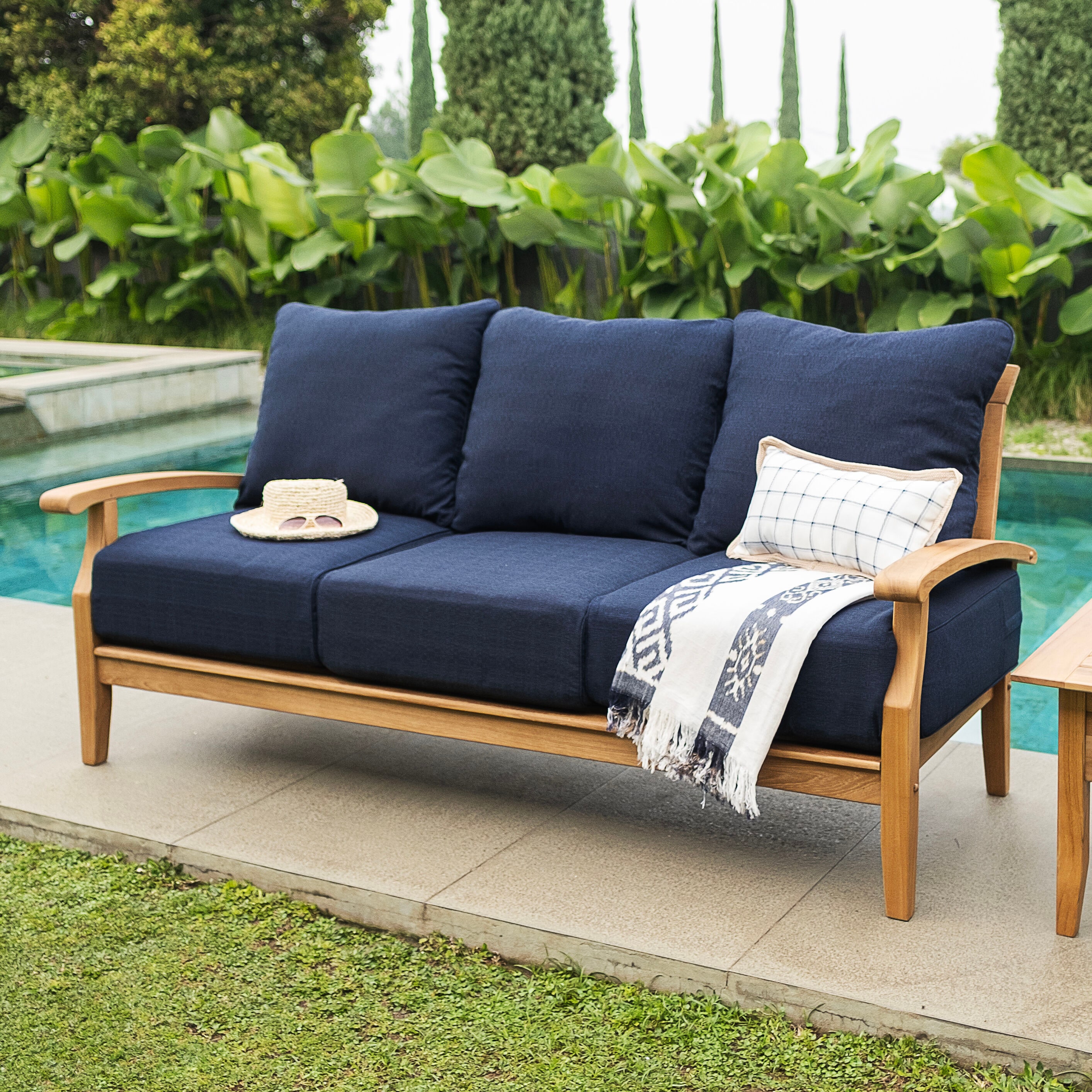 Cambridge Casual Auburn Outdoor Sofa with Navy Cushions and Teak Frame