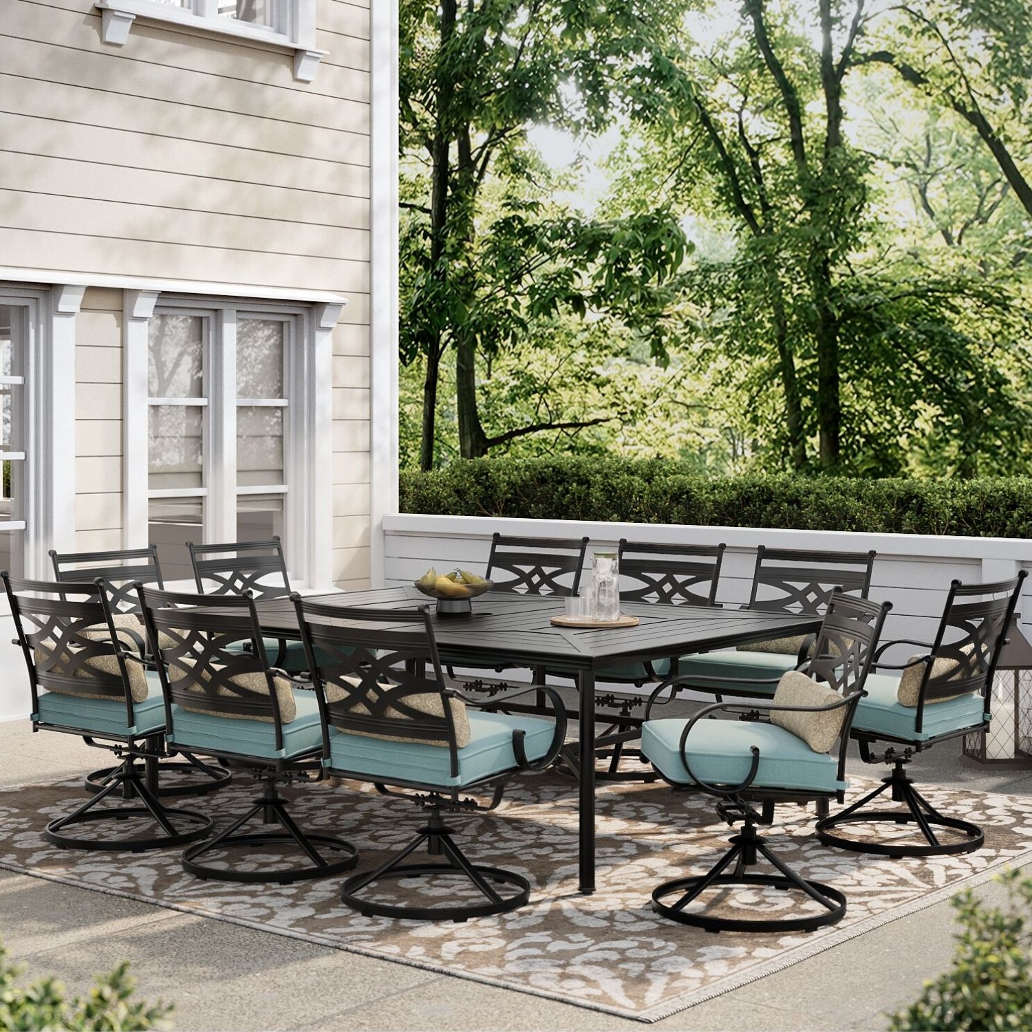 Hanover MCLRDN11PCSW10-BLU Montclair 11 -Piece Dark Brown Patio Dining Set Steel Rectangle Table with 10 Blue Cushions Swivel Rocker Chairs