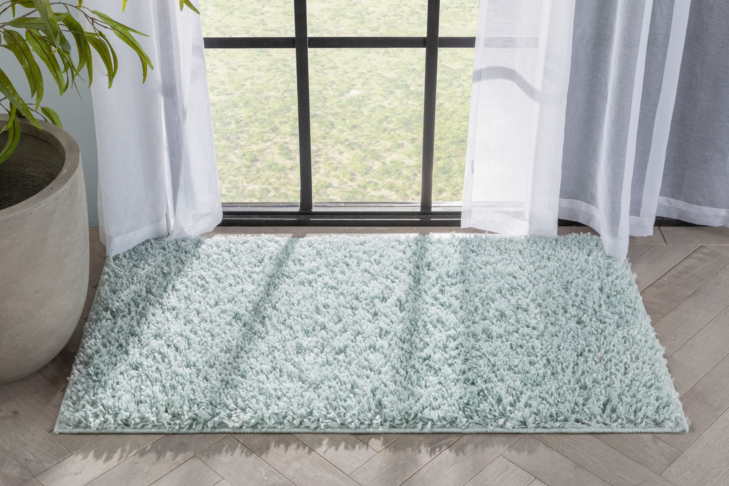 Seafoam Green Solid Shag Reversible Synthetic Area Rug