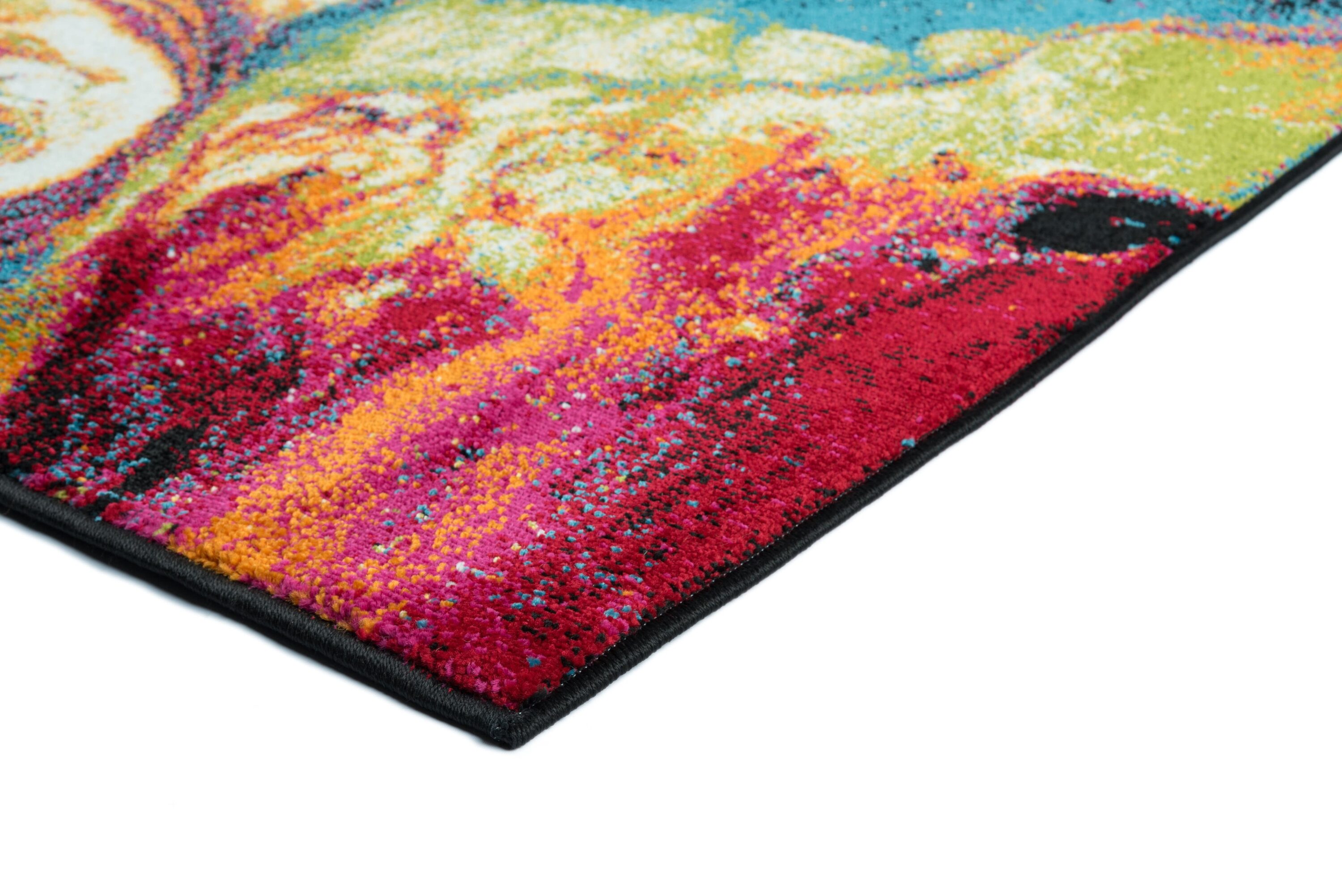 Reversible Abstract Black 5'3" x 7'3" Synthetic Area Rug