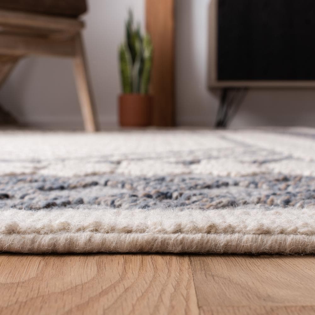 Natura Cream and Navy Handwoven Wool 6' x 9' Area Rug