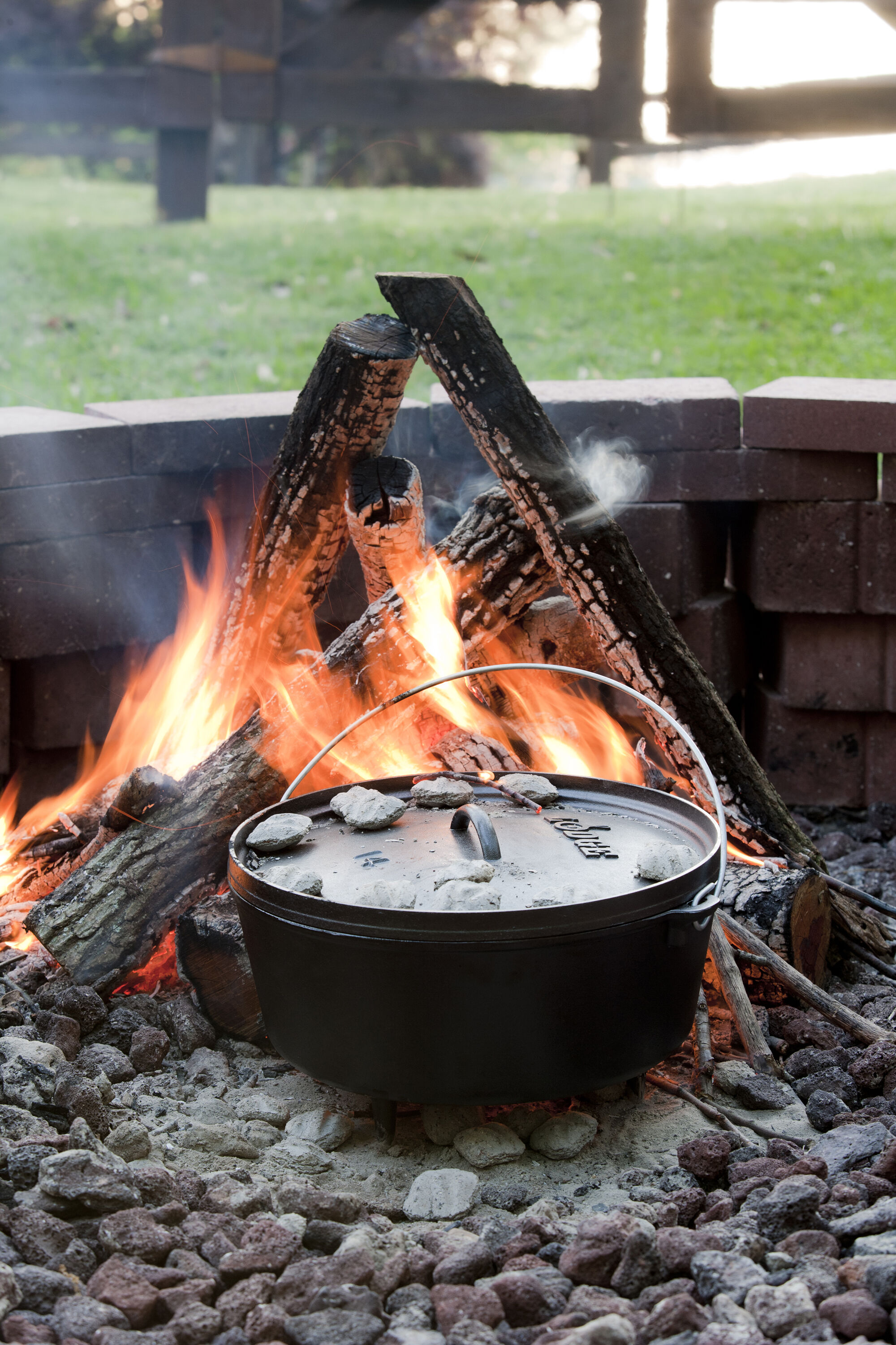 Lodge Cast Iron 10 Quart/14 Inch Cast Iron Camp Dutch Oven with Lid -  Induction Compatible - Black in the Cooking Pots department at