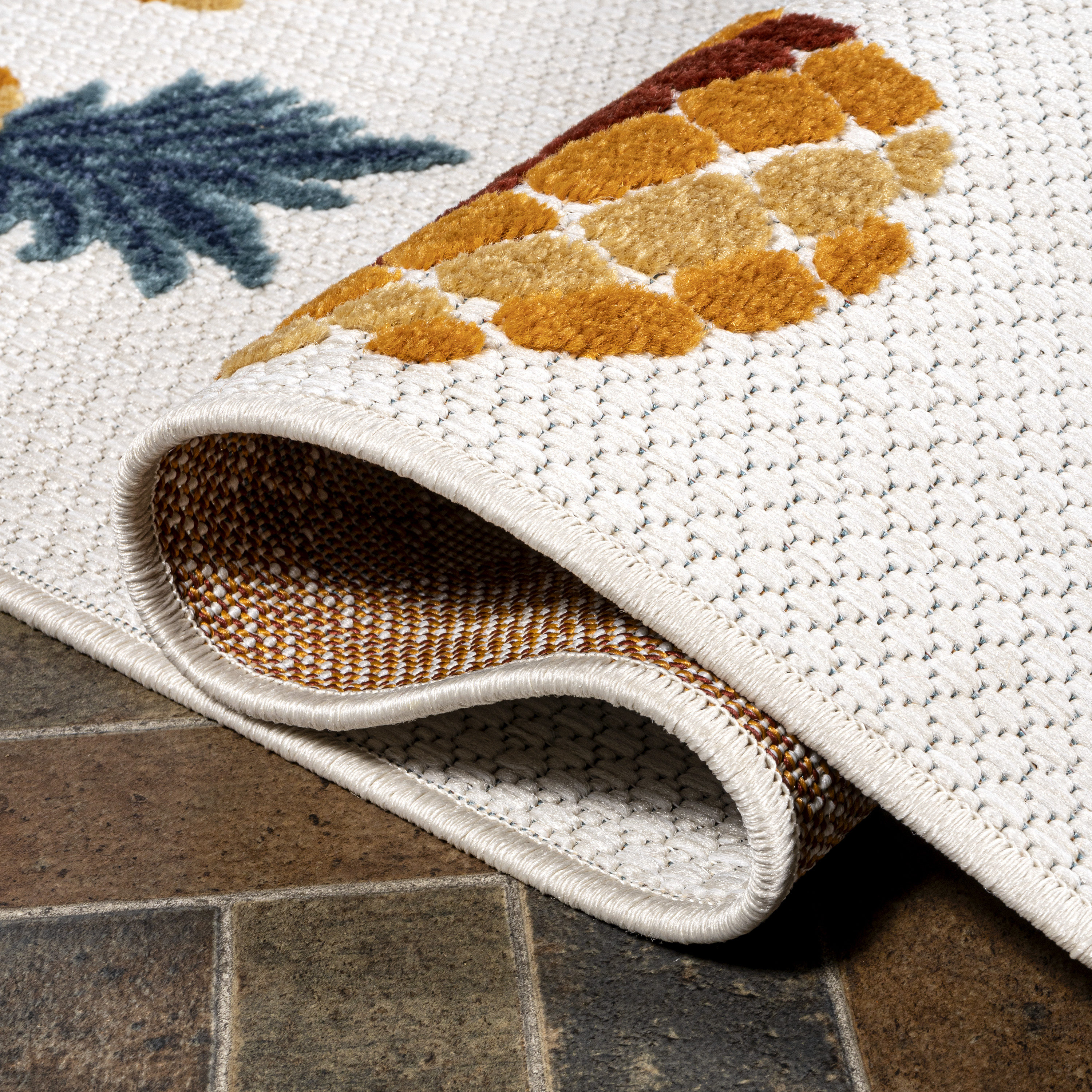 4' x 6' Ivory and Orange Floral Synthetic Area Rug