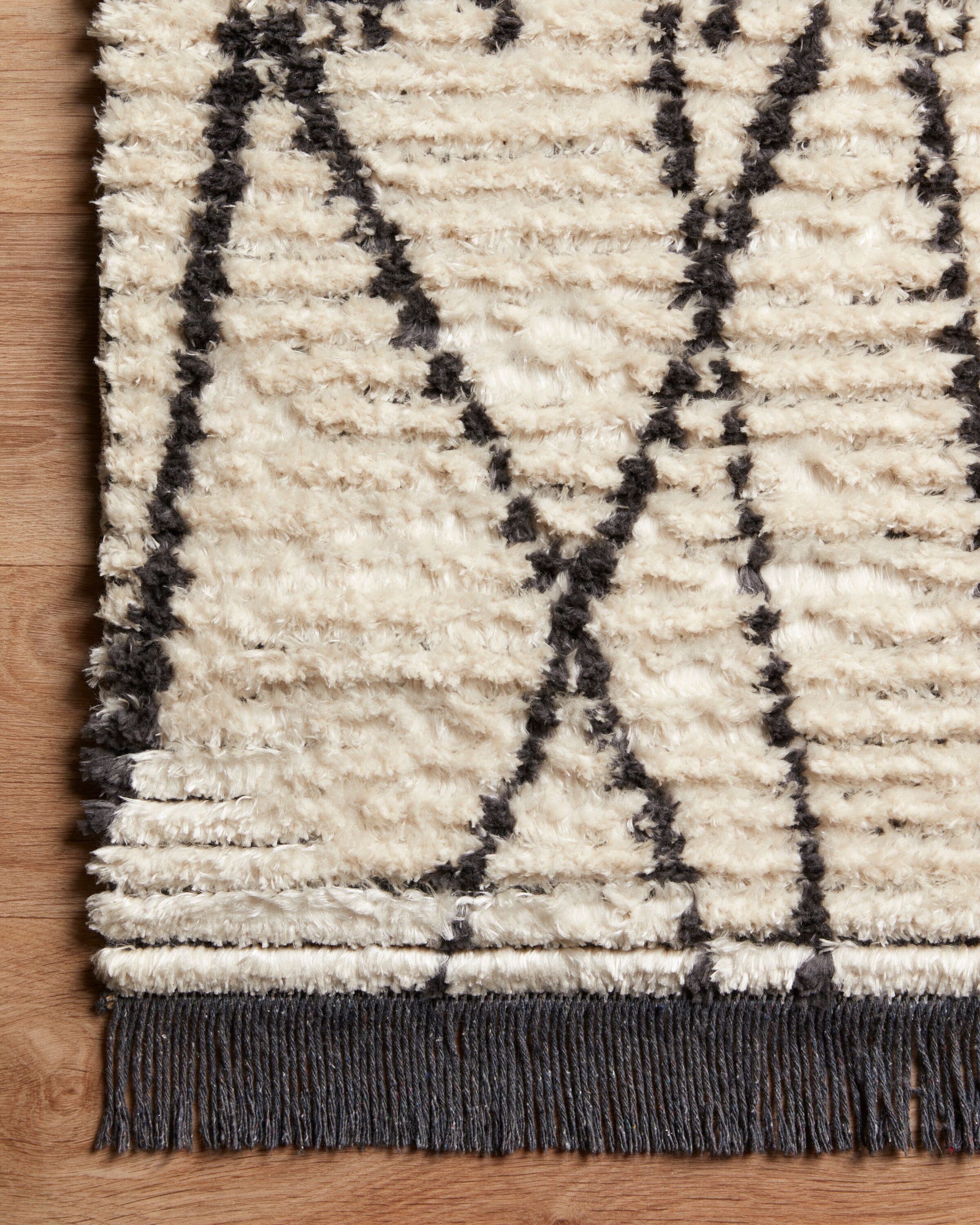 Ivory and Charcoal Abstract Synthetic Reversible Rug 31" x 120"